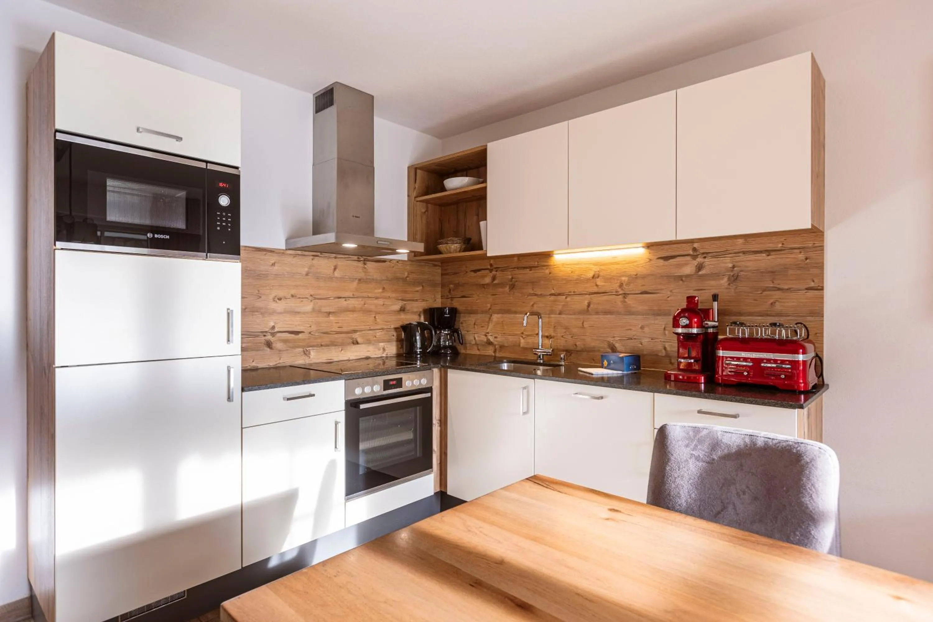 kitchen in Tauernsuites Mitterwirt by ALPS RESORTS
