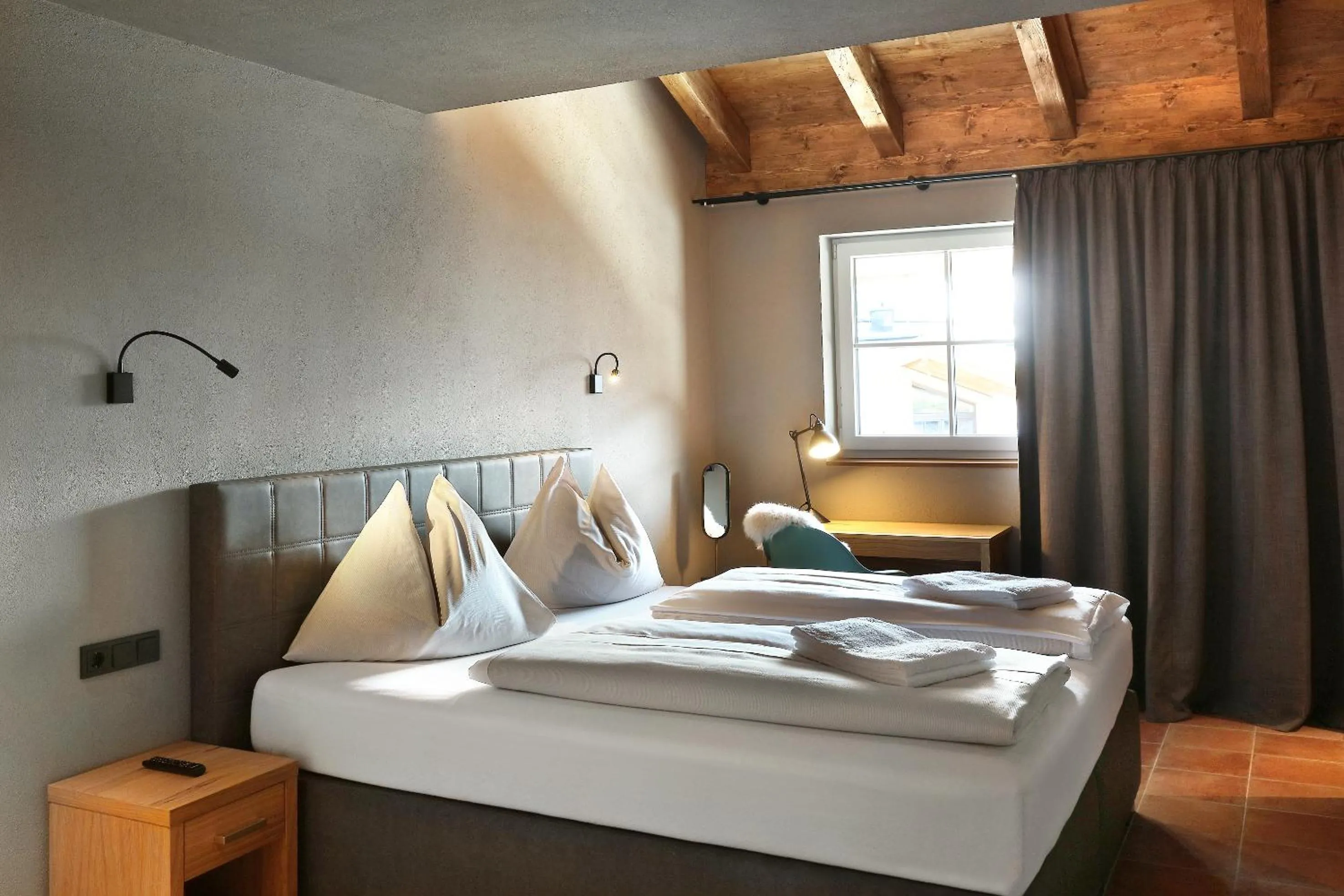 Bed in Tauernsuites Mitterwirt by ALPS RESORTS