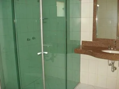 Shower in Flamboyant Suite Hotel