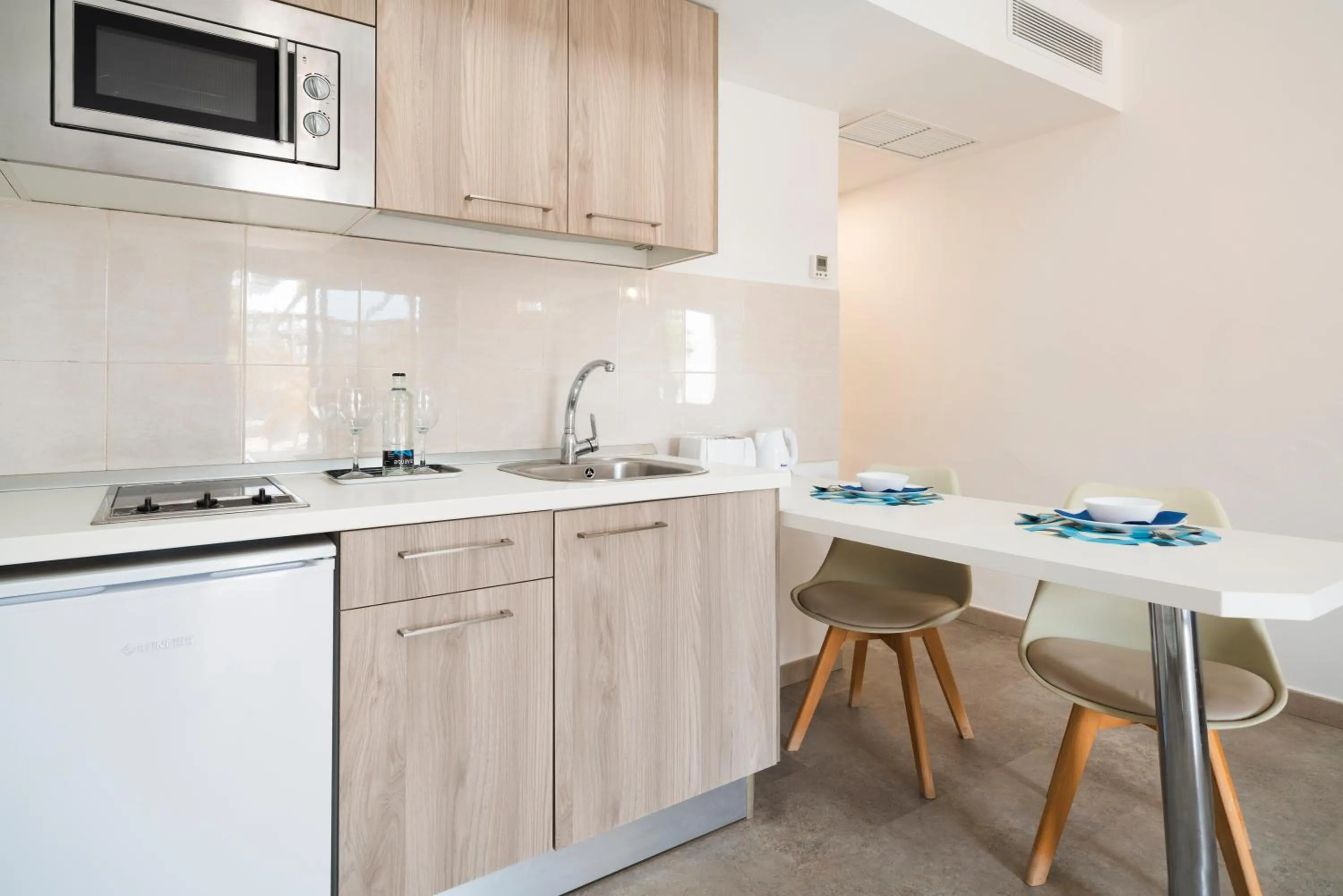 Kitchen or kitchenette in Apartamentos Santa Rosa