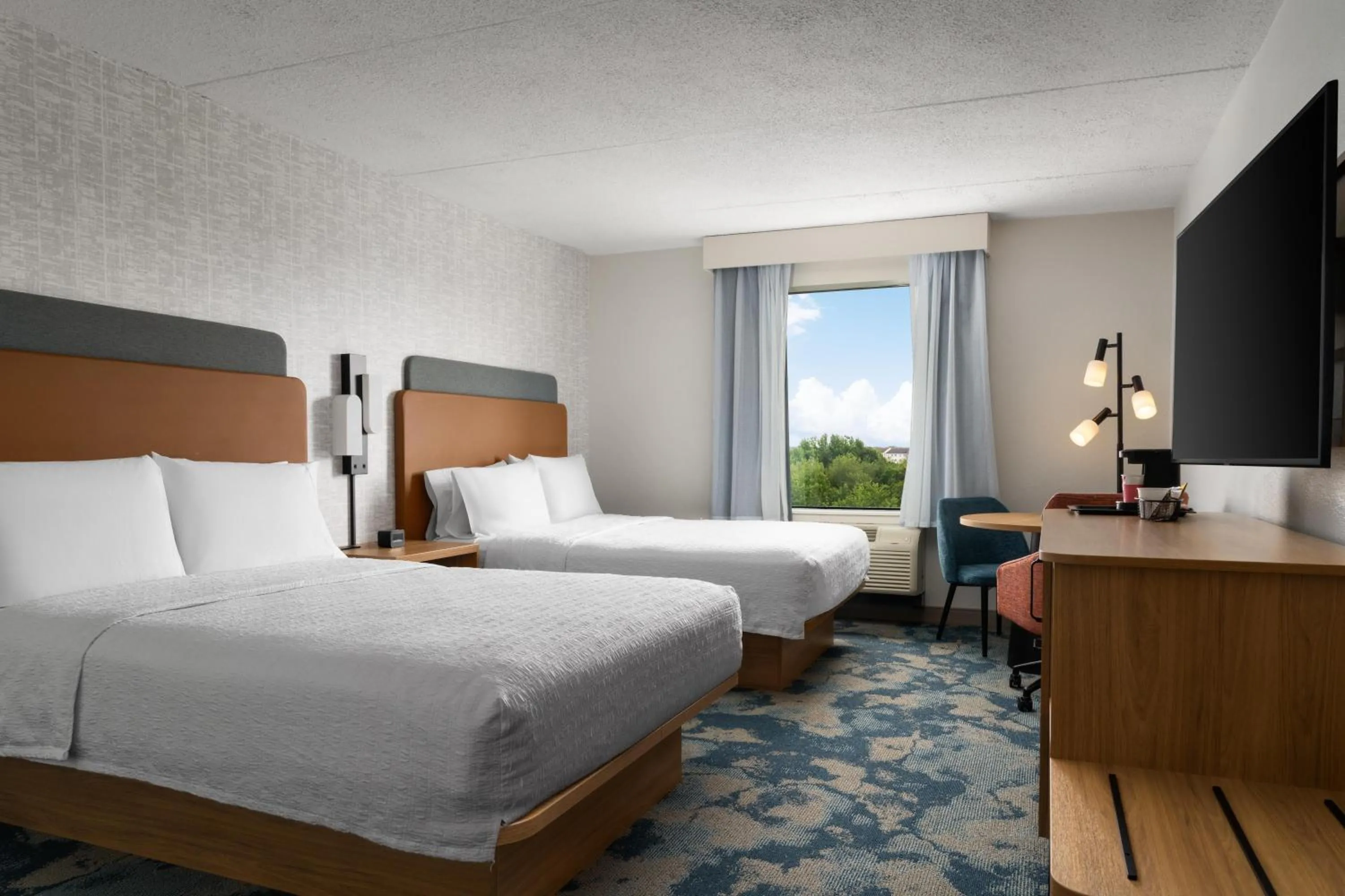 Bed in Hampton Inn Neptune