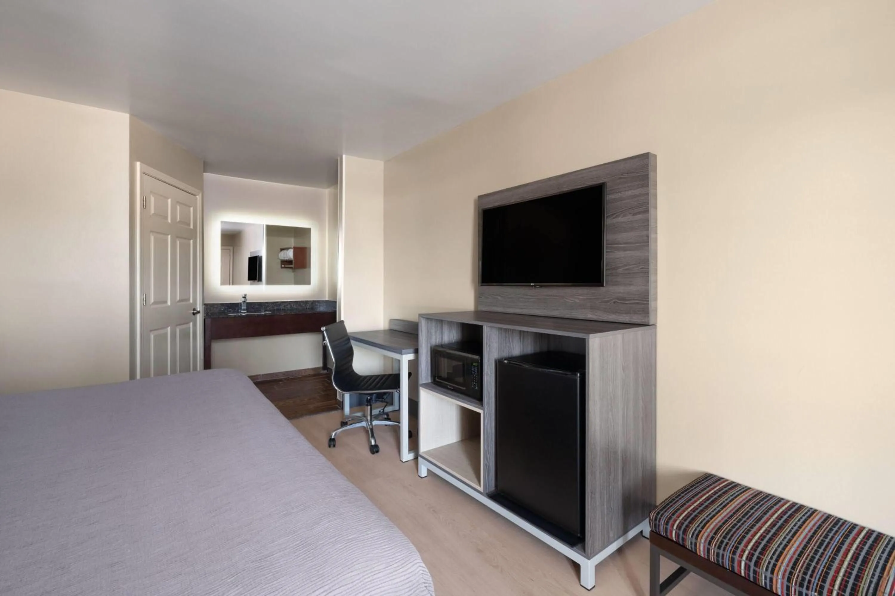 Photo of the whole room, Bed in Baymont by Wyndham Commerce GA Near Tanger Outlets Mall