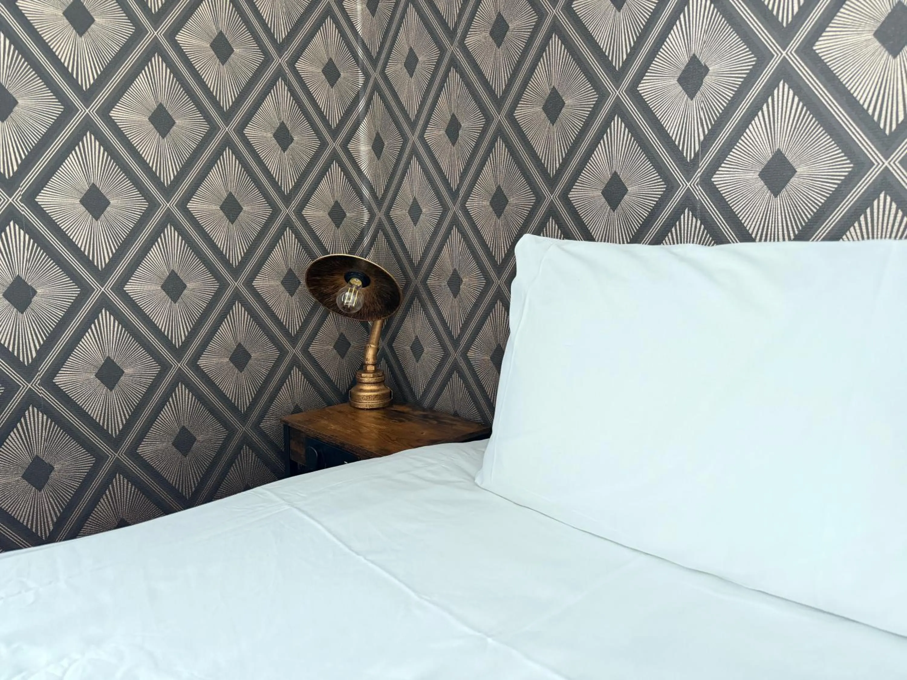 Bed in The Derby Hotel