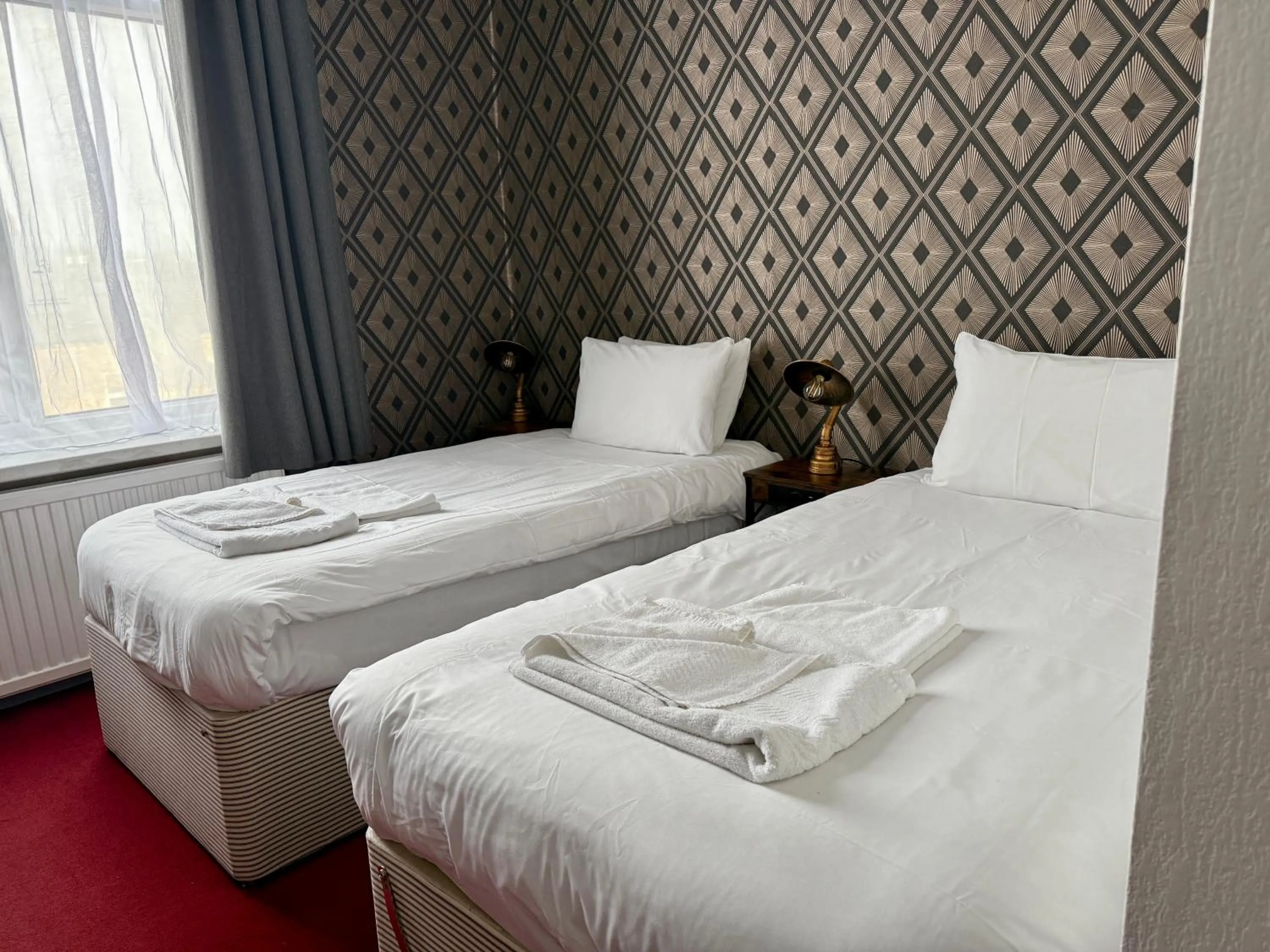 Bed in The Derby Hotel