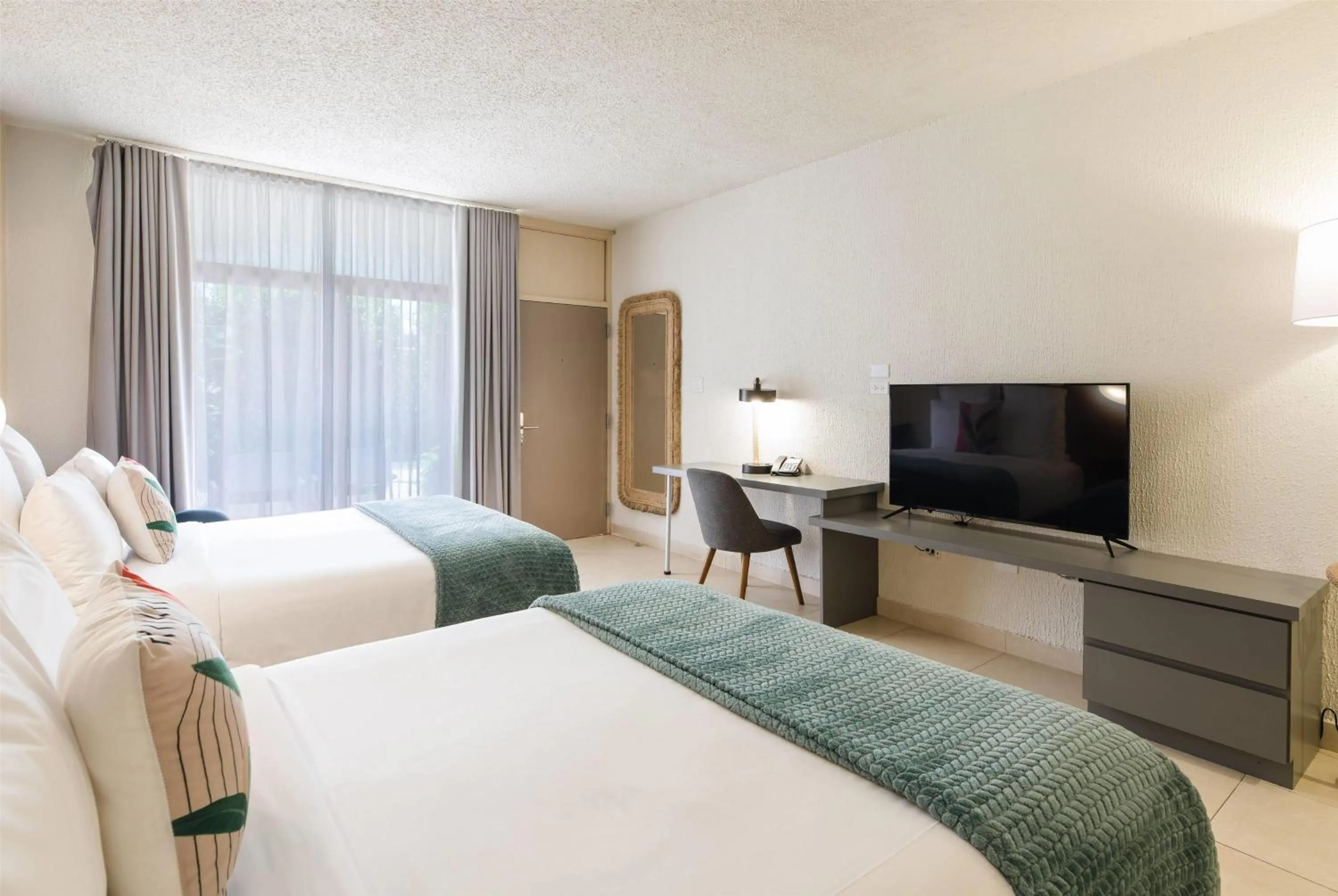 Photo of the whole room, Bed in Wyndham Palmas Beach and Golf Boutique Resort