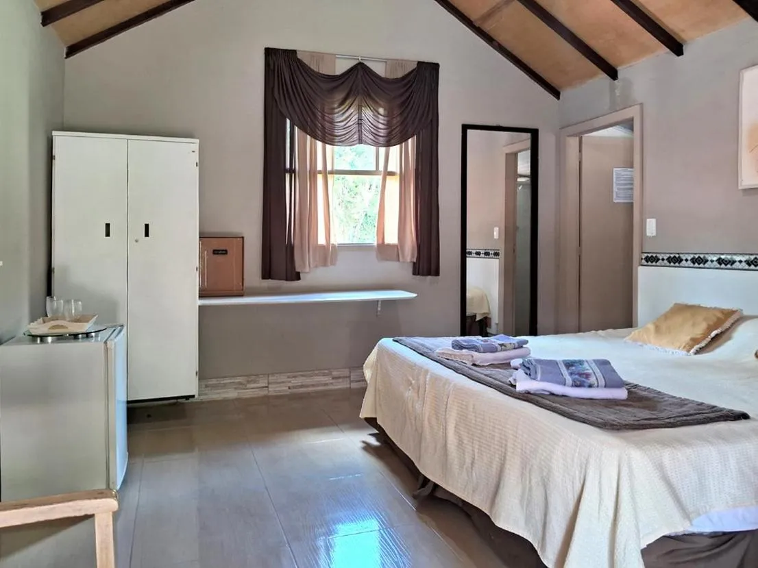 Bed in Pousada Juriti - Eco Hotel