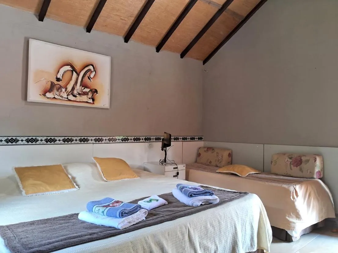 Bed in Pousada Juriti - Eco Hotel