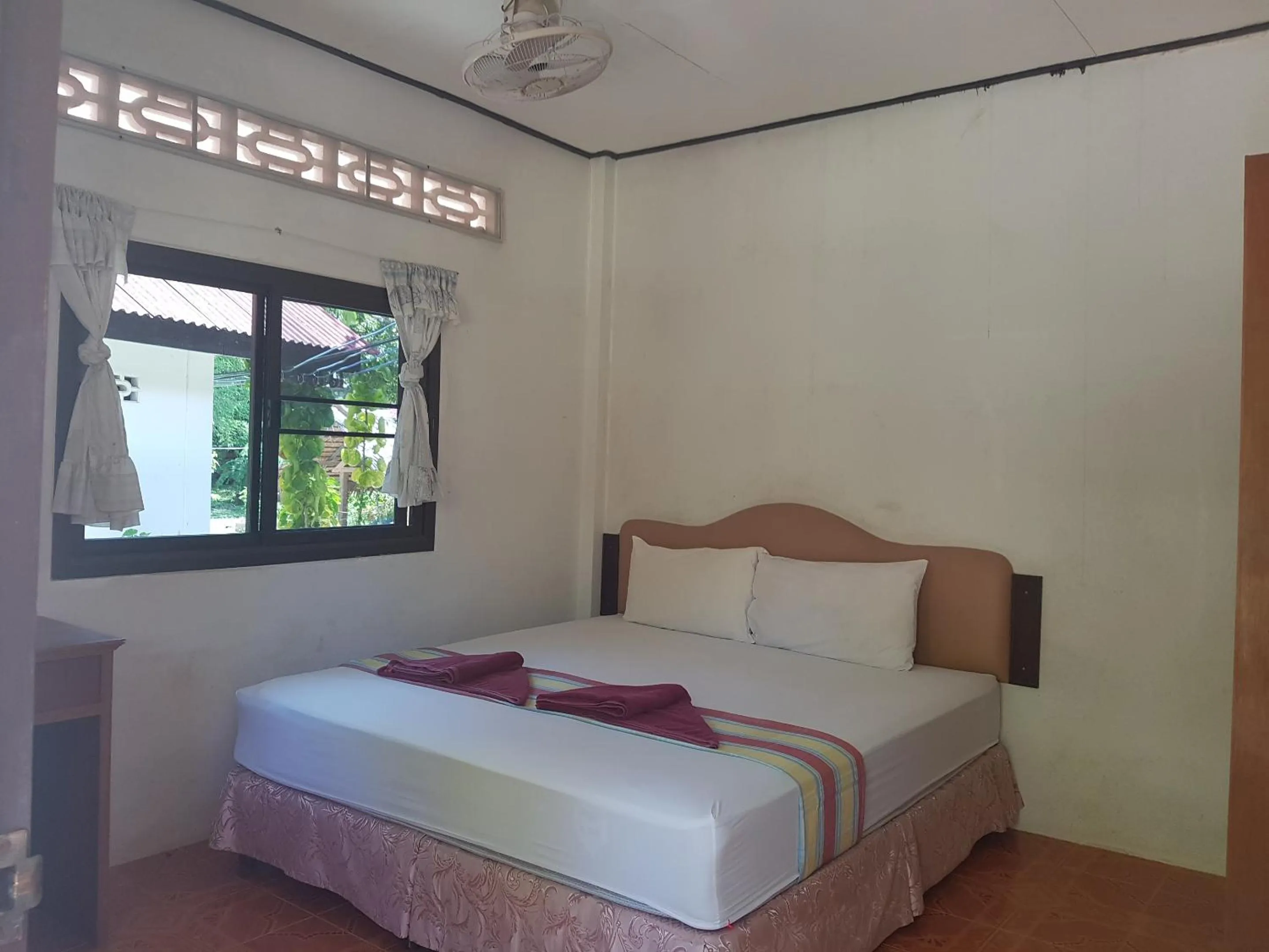 Bed in Nice Beach Resort Koh Pha-ngan