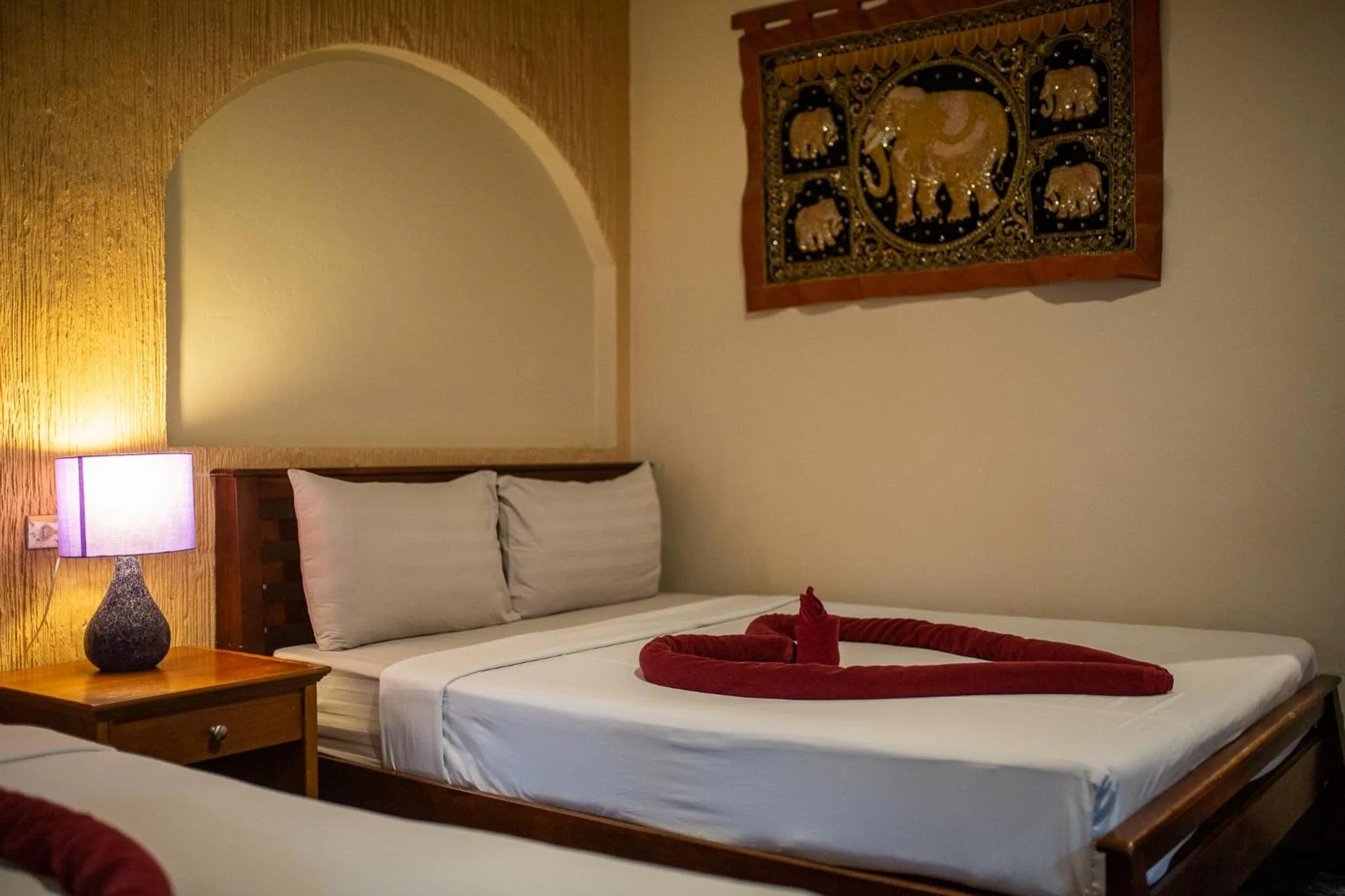 Bed in Nice Beach Resort Koh Pha-ngan