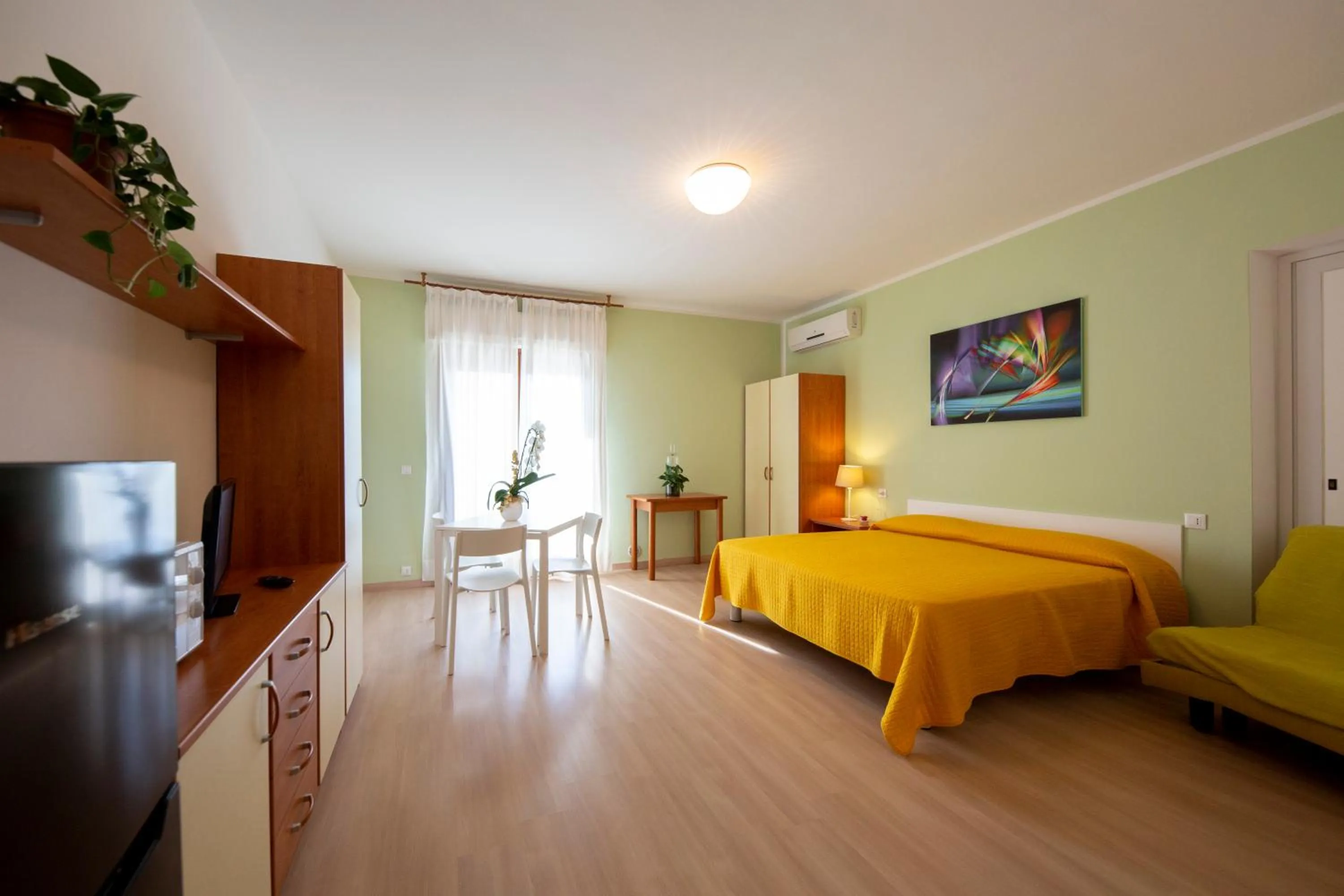 Bed in Holiday Appartamenti