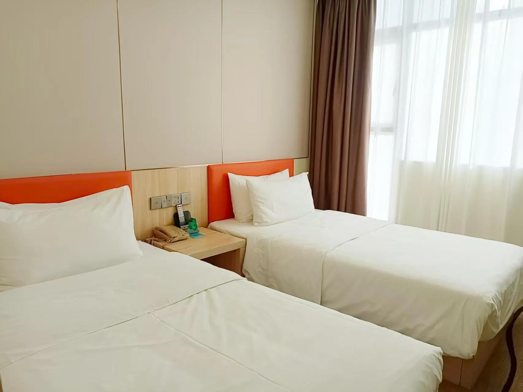 Bed in Guangdong Baiyun City Hotel