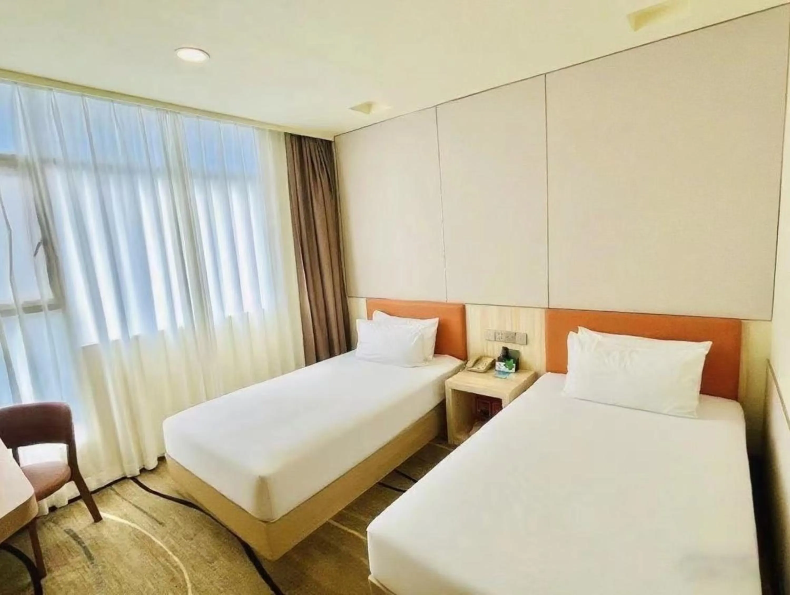 Bed in Guangdong Baiyun City Hotel