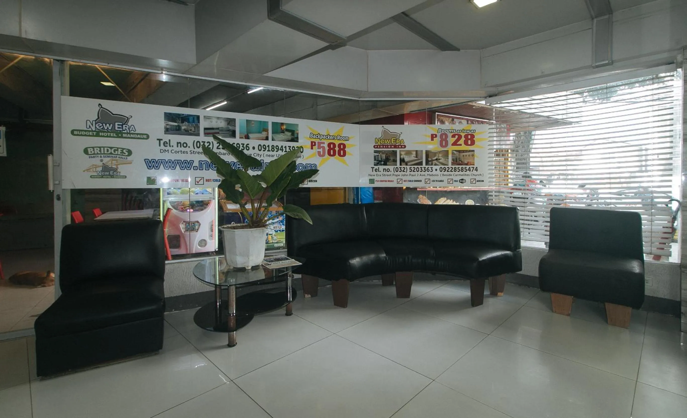 Seating area in RedDoorz Plus New Era Budget Hotel Mandaue former RedDoorz Plus near UV Mandaue Cebu