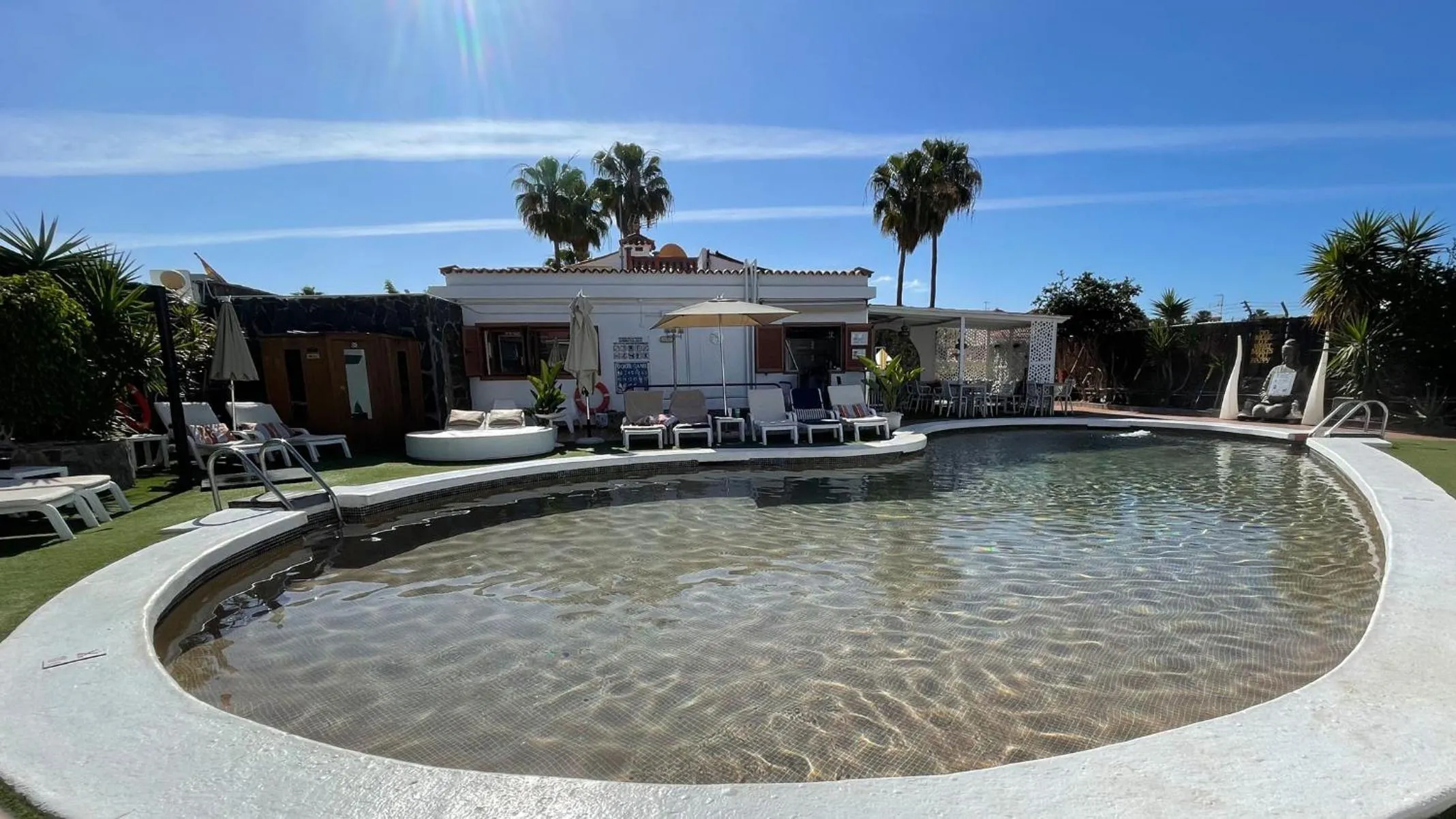 Pool view in Rainbow Golf Bungalows, Gay Men-only Resort