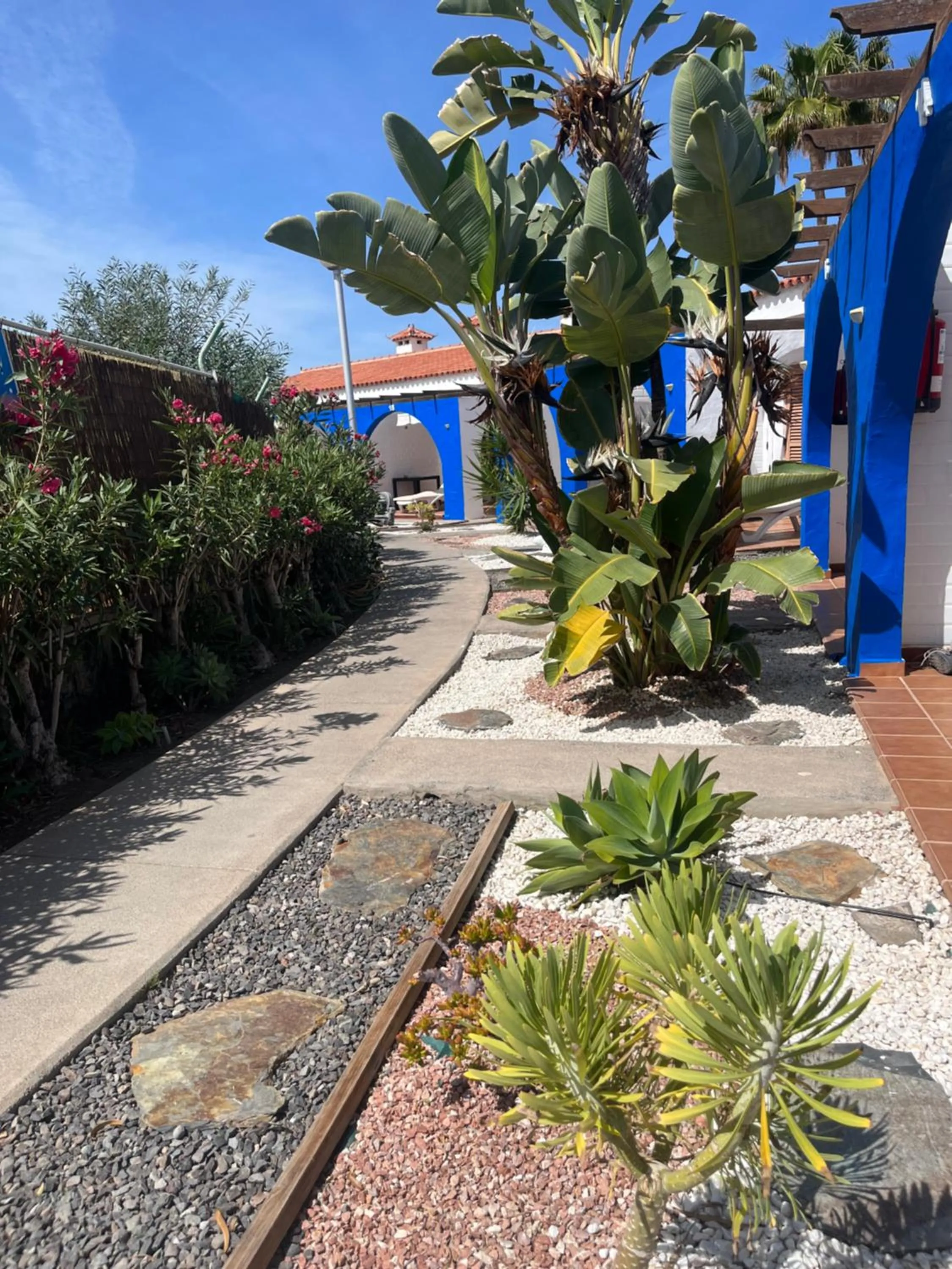 Property building in Rainbow Golf Bungalows, Gay Men-only Resort