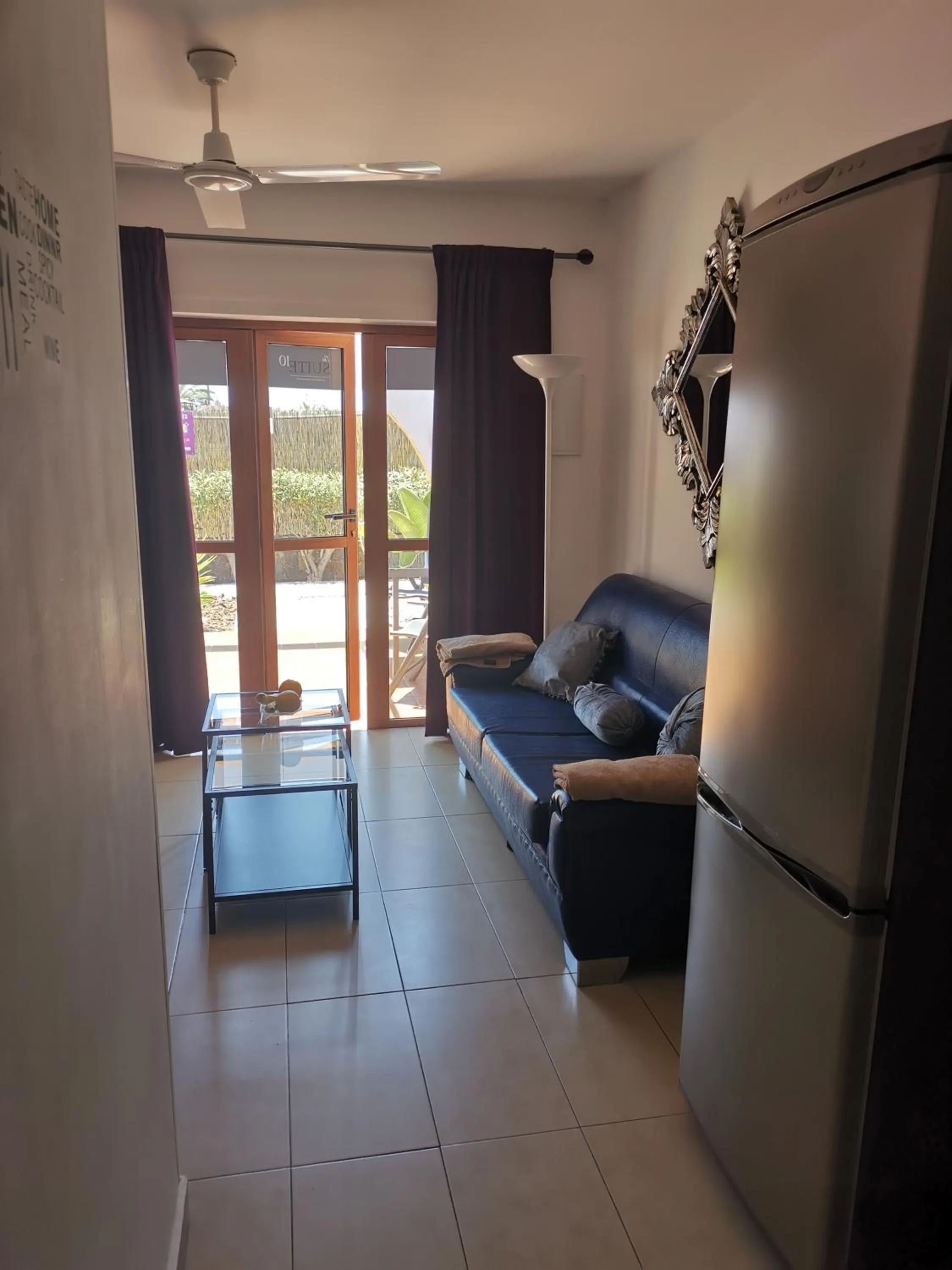 Living room in Rainbow Golf Bungalows, Gay Men-only Resort