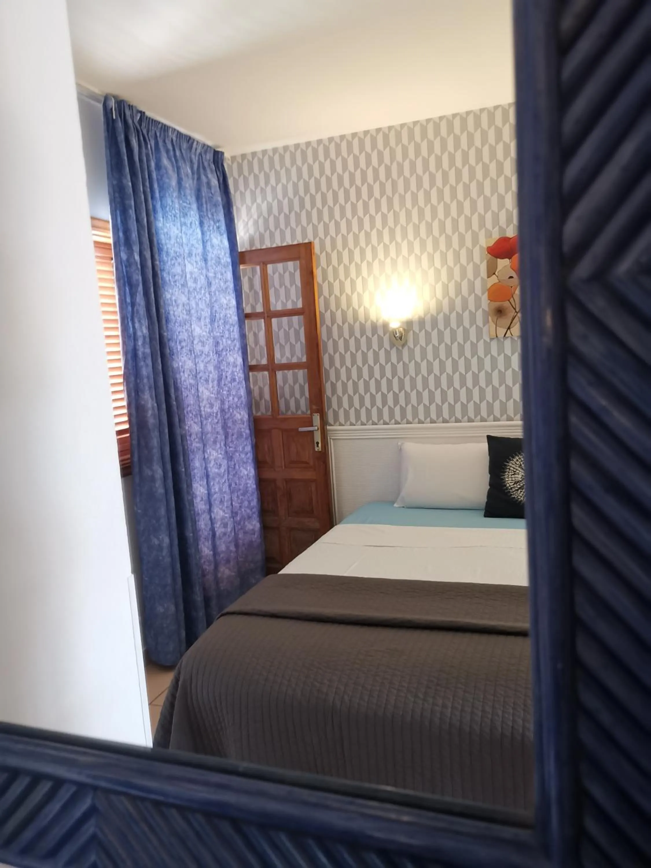 Bedroom, Bed in Rainbow Golf Bungalows, Gay Men-only Resort