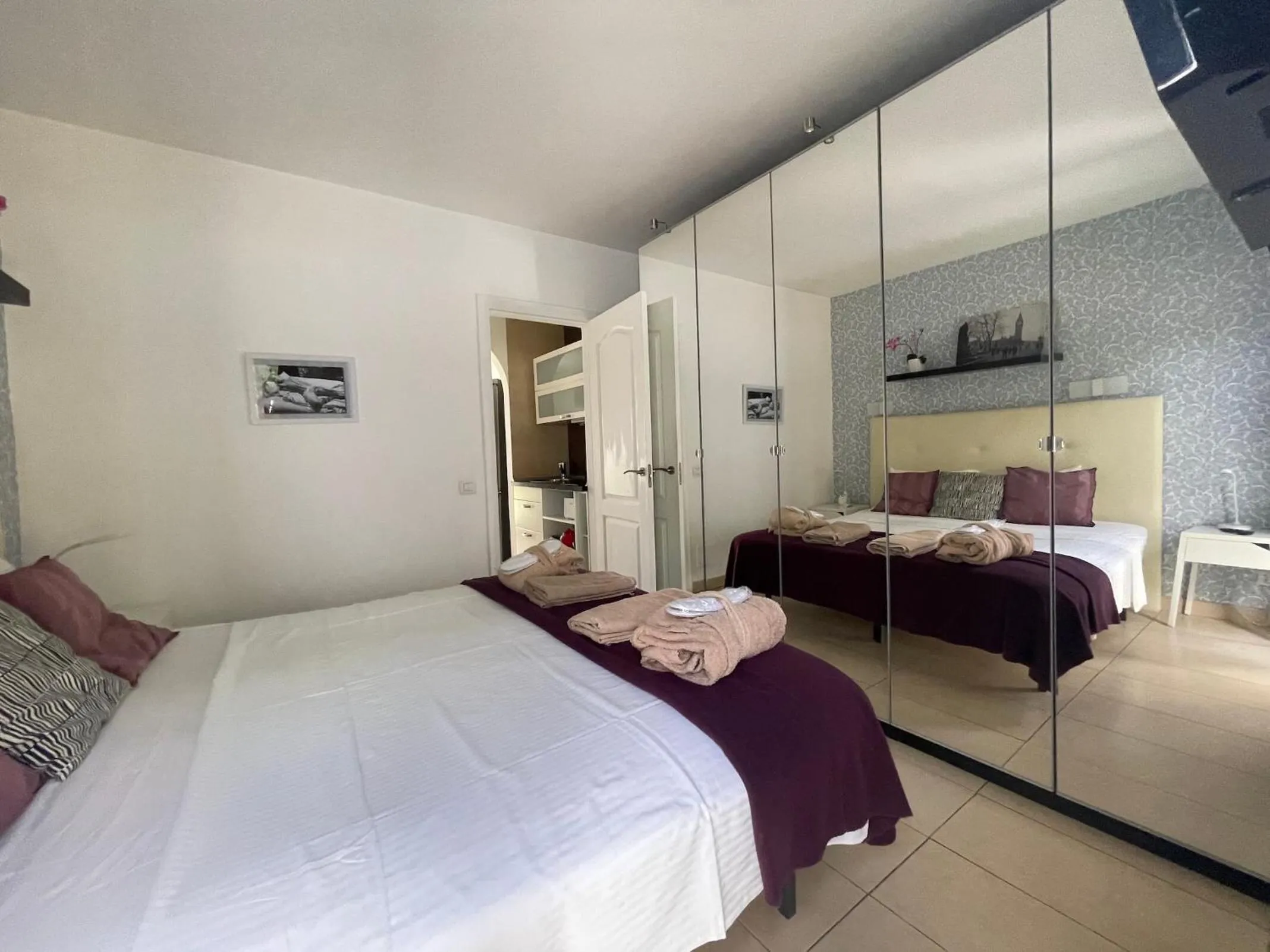 Bed in Rainbow Golf Bungalows, Gay Men-only Resort