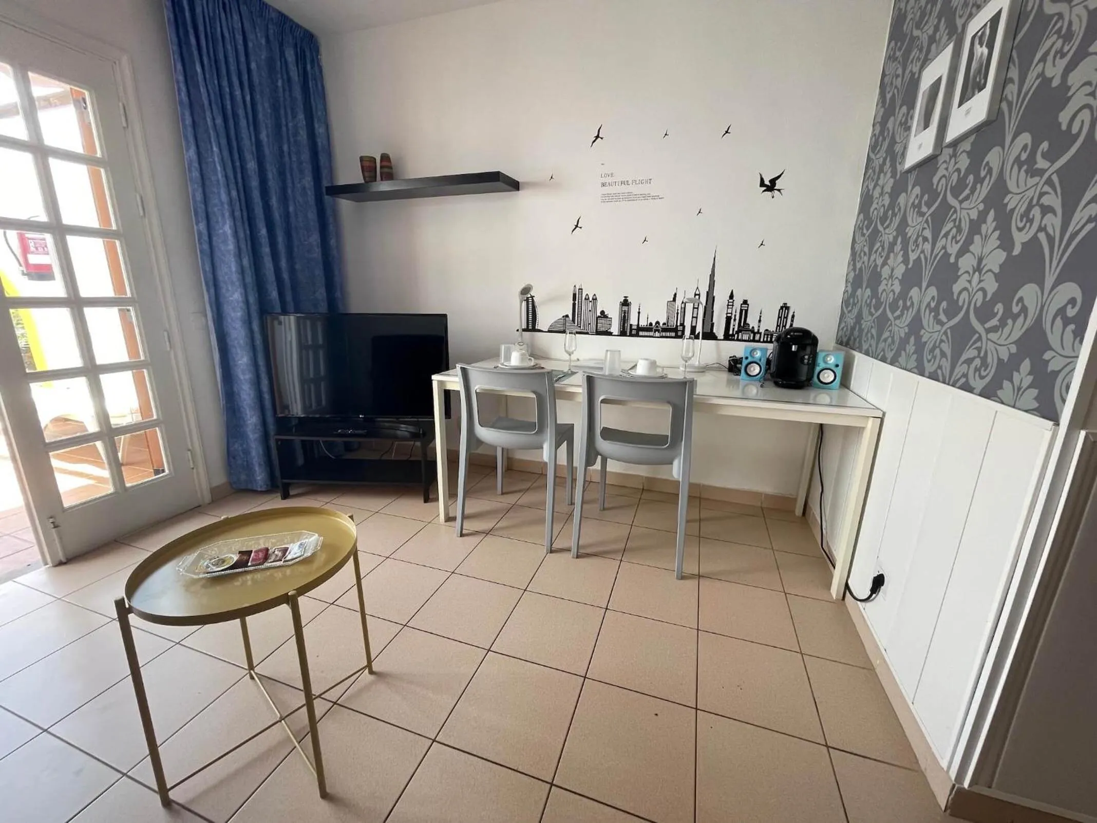 Living room in Rainbow Golf Bungalows, Gay Men-only Resort