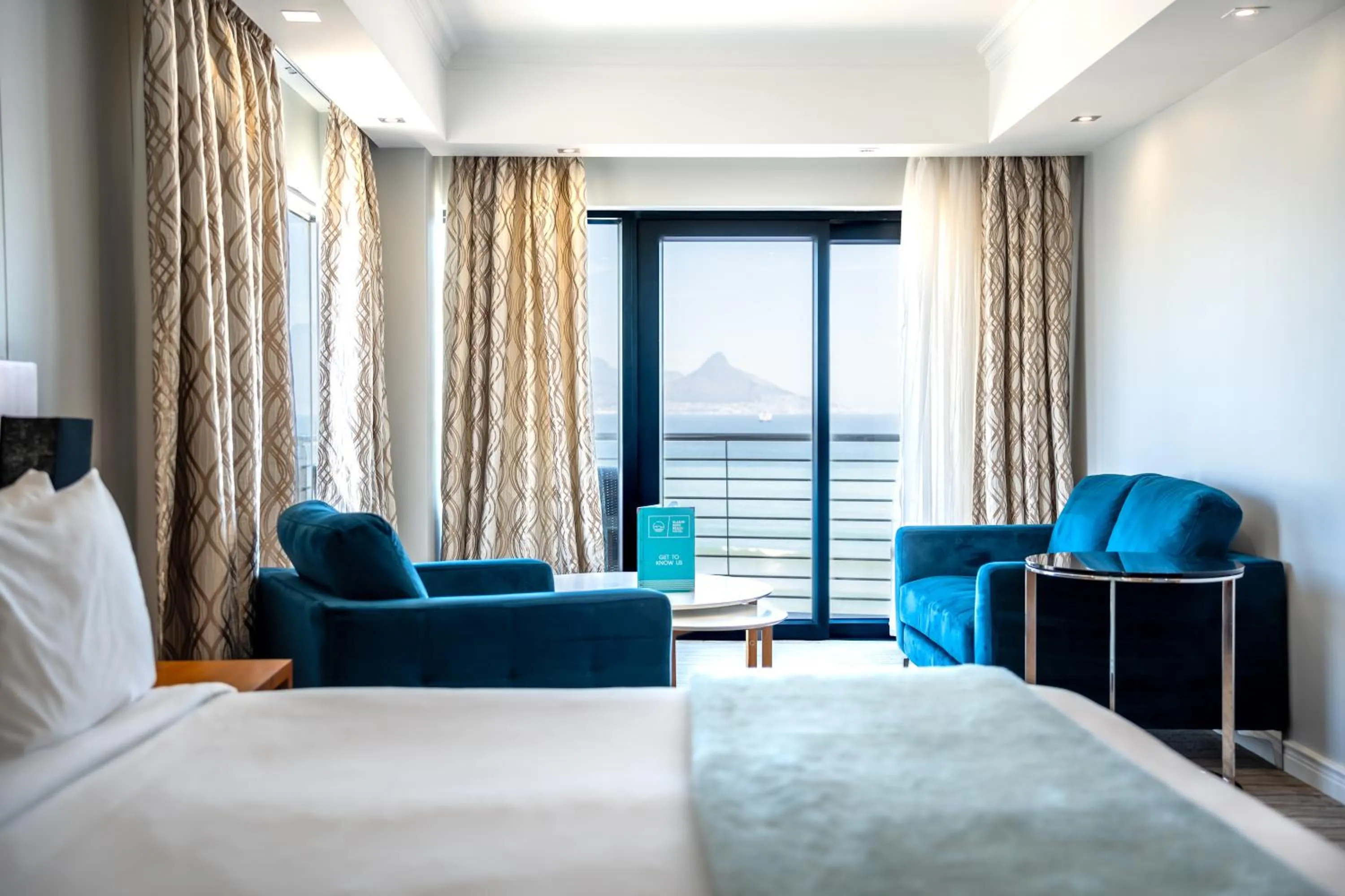 Seating area, Bed in Blaauwberg Beach Hotel