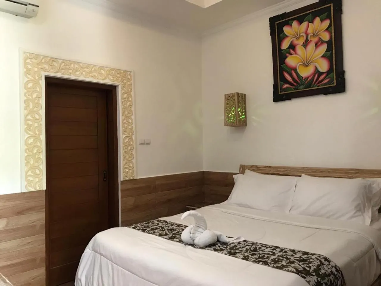 Bed in Mikuk Homestay Canggu