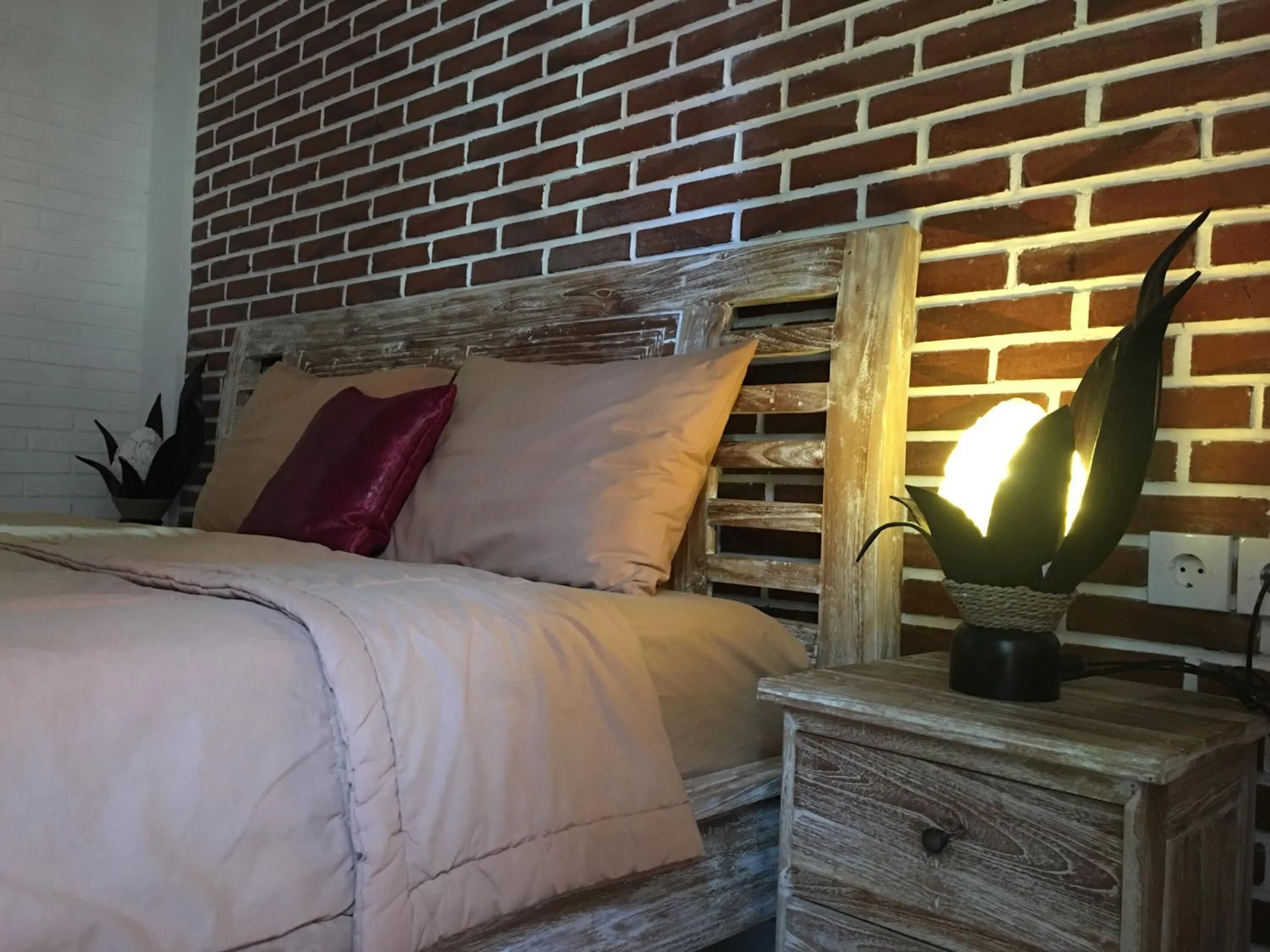 Bed in Mikuk Homestay Canggu