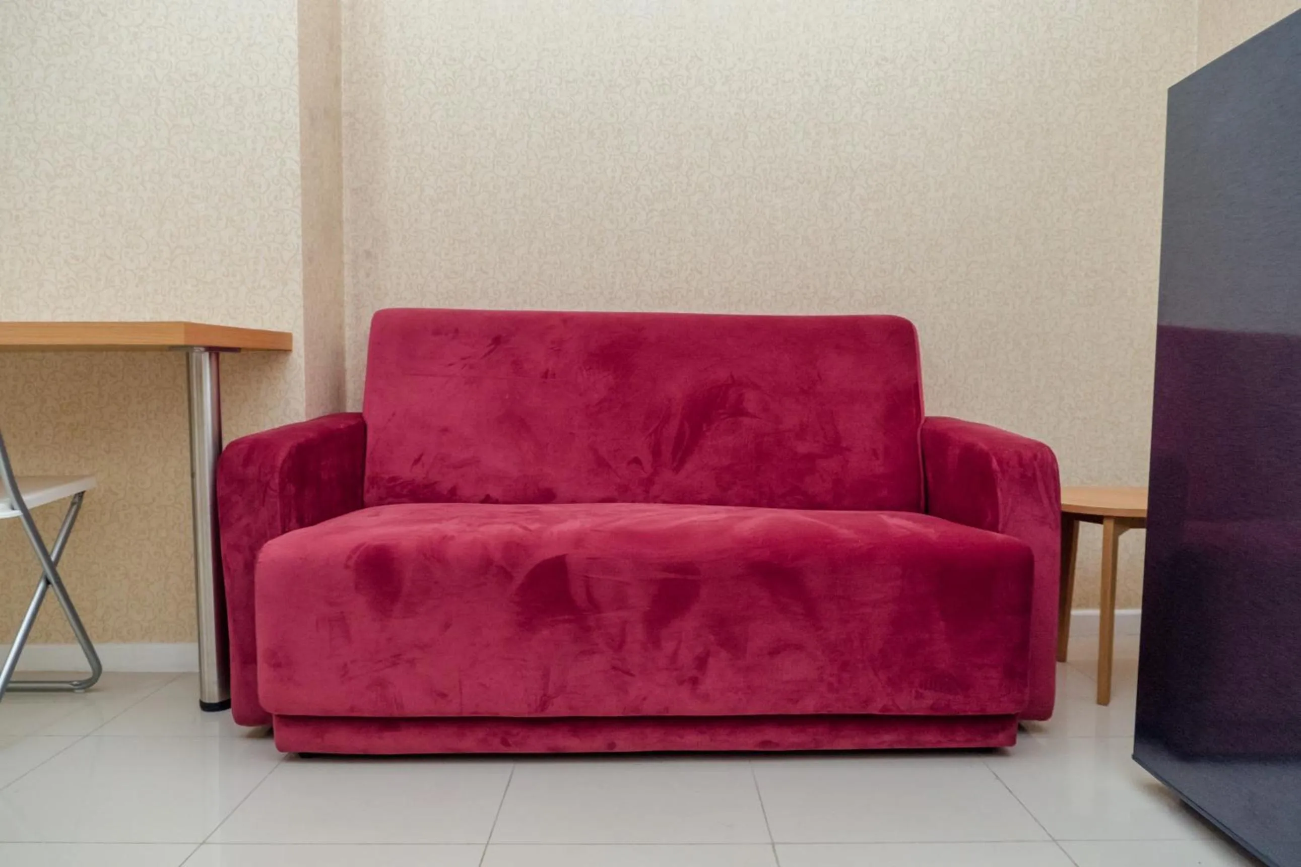 Minimalist 2BR Apartment at Parahyangan Residence By Travelio