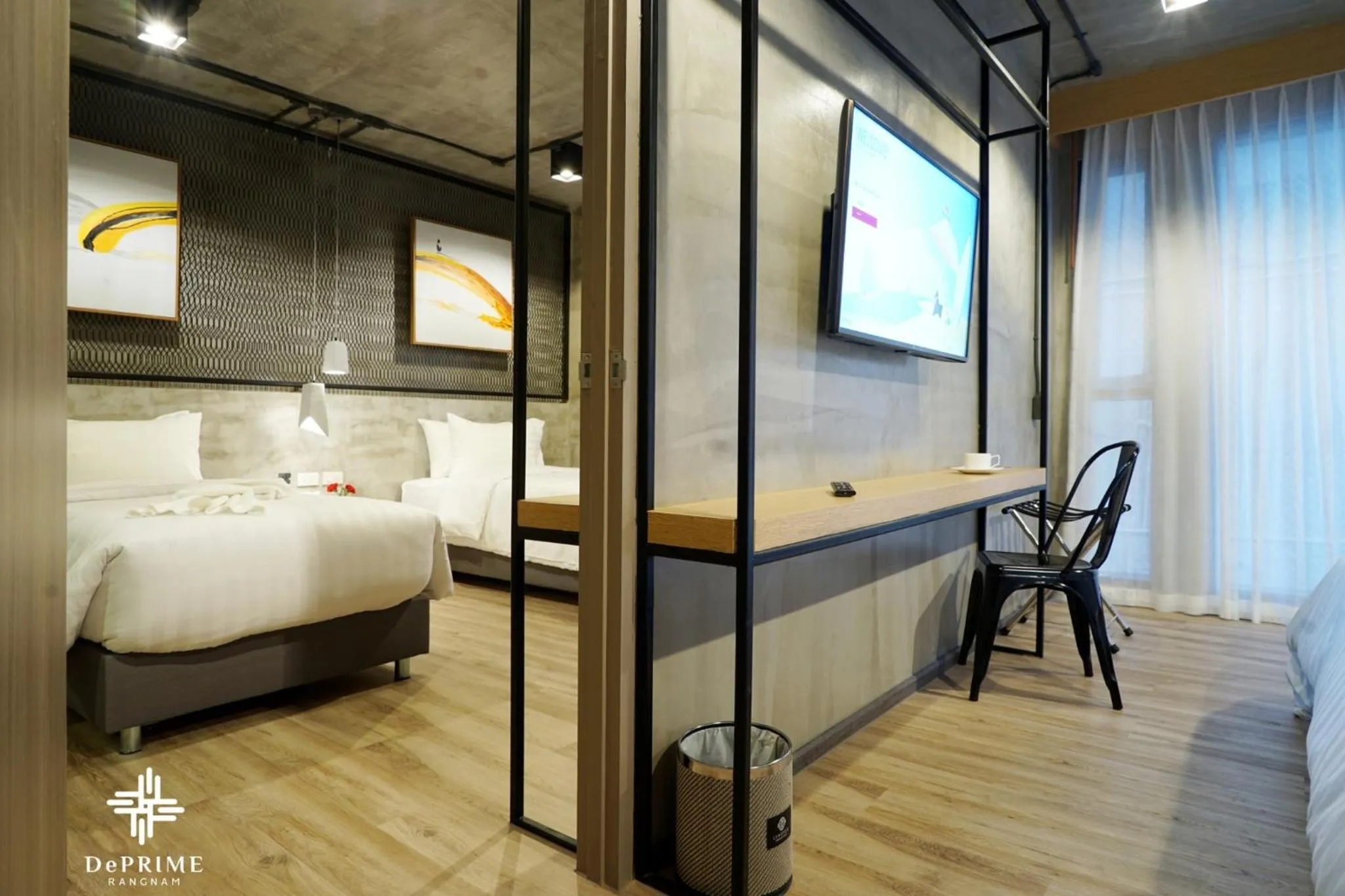 Bed in De Prime Rangnam Hotel