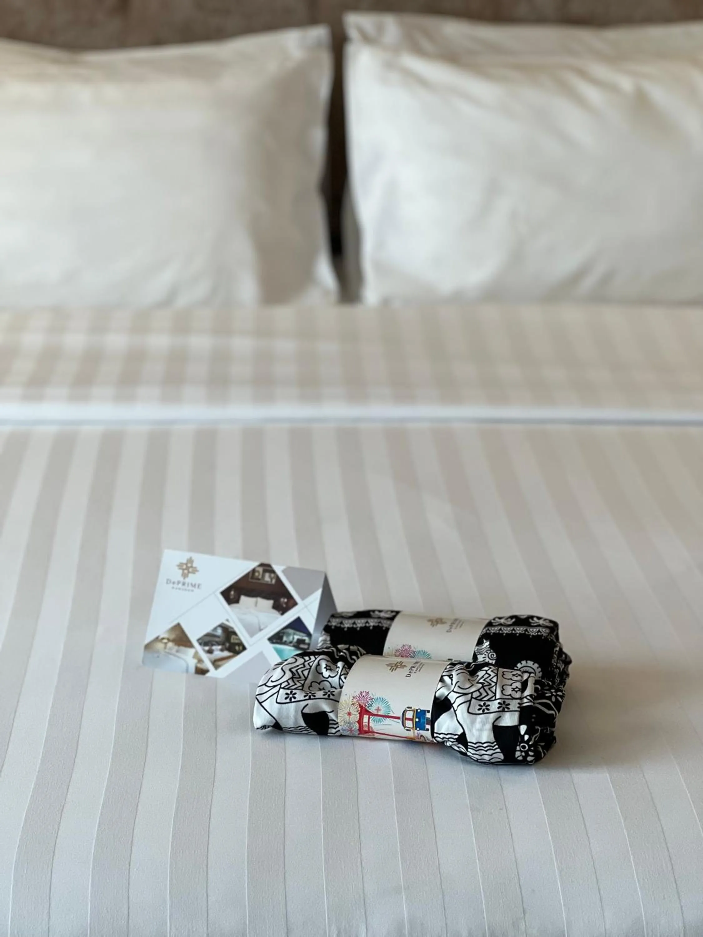 Bed in De Prime Rangnam Hotel