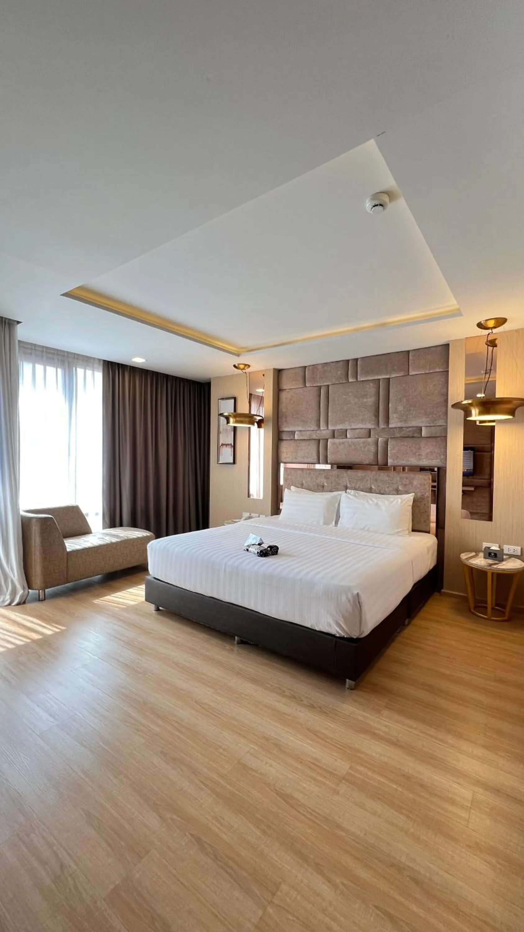 Bed in De Prime Rangnam Hotel