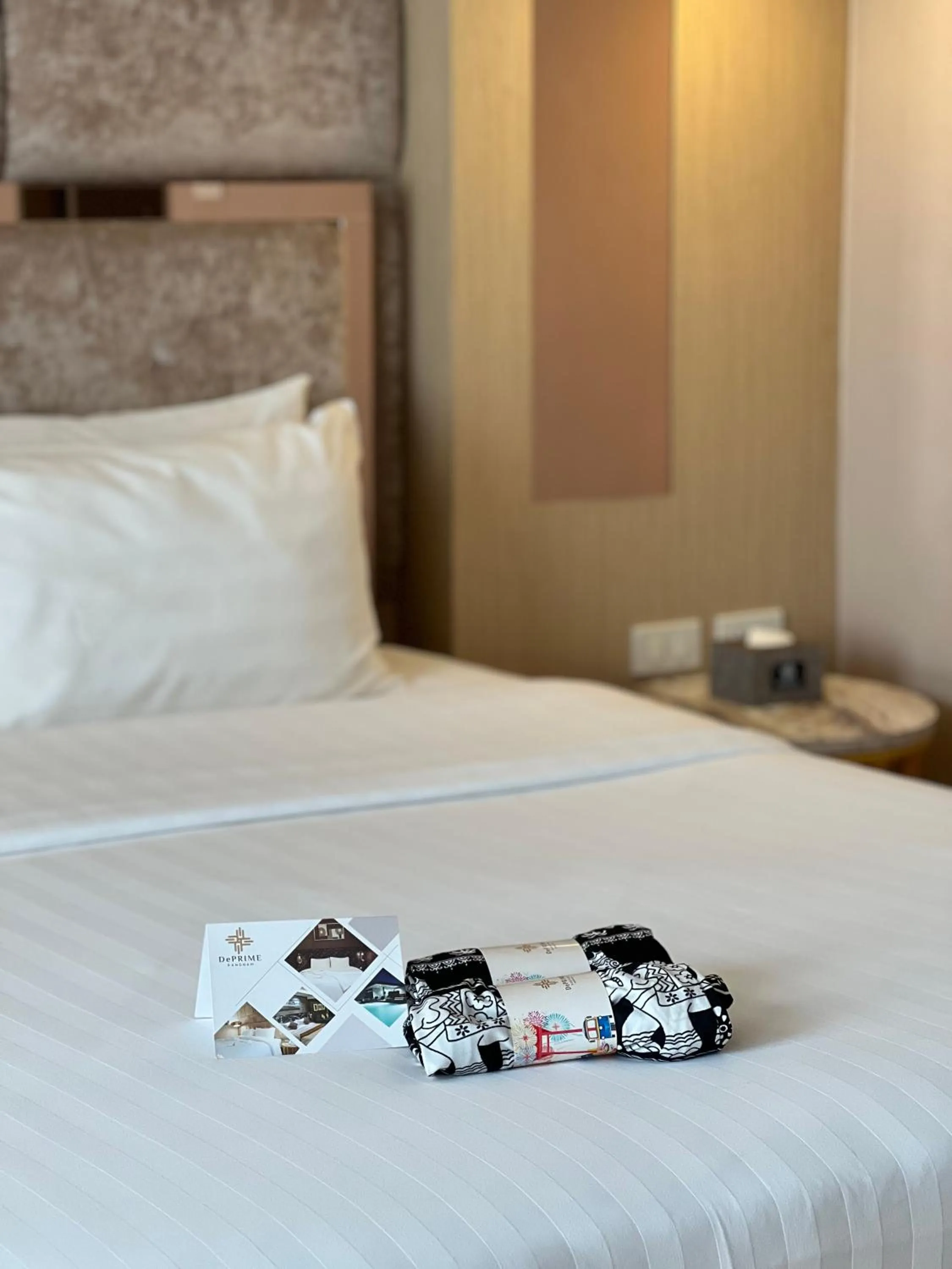 Bed in De Prime Rangnam Hotel