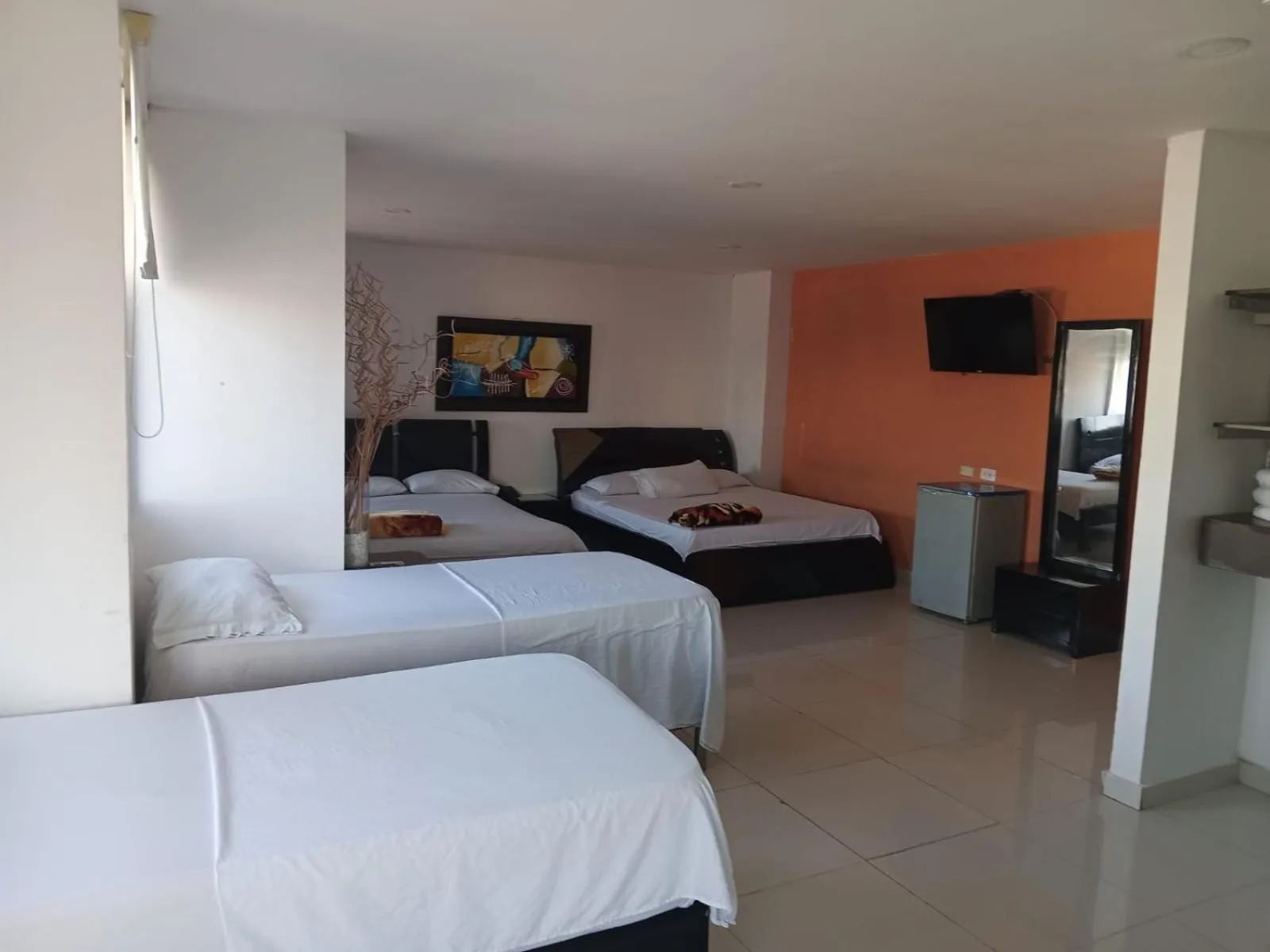 Bed in Hotel Intersuites