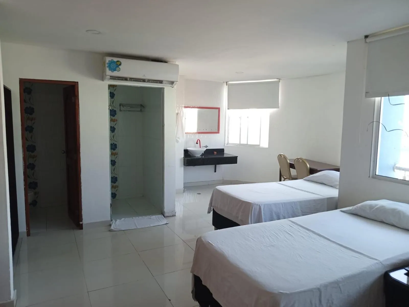 Bed in Hotel Intersuites