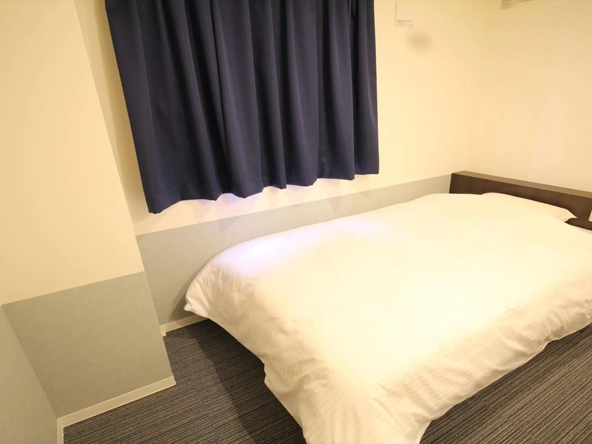 Bed in Hotel Taiyo Noen Nibancho