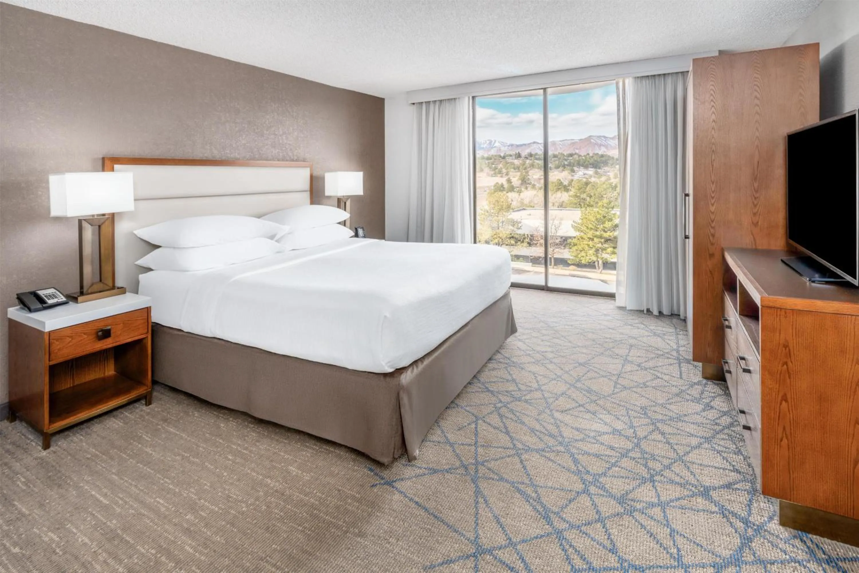 Bed in Embassy Suites by Hilton Colorado Springs