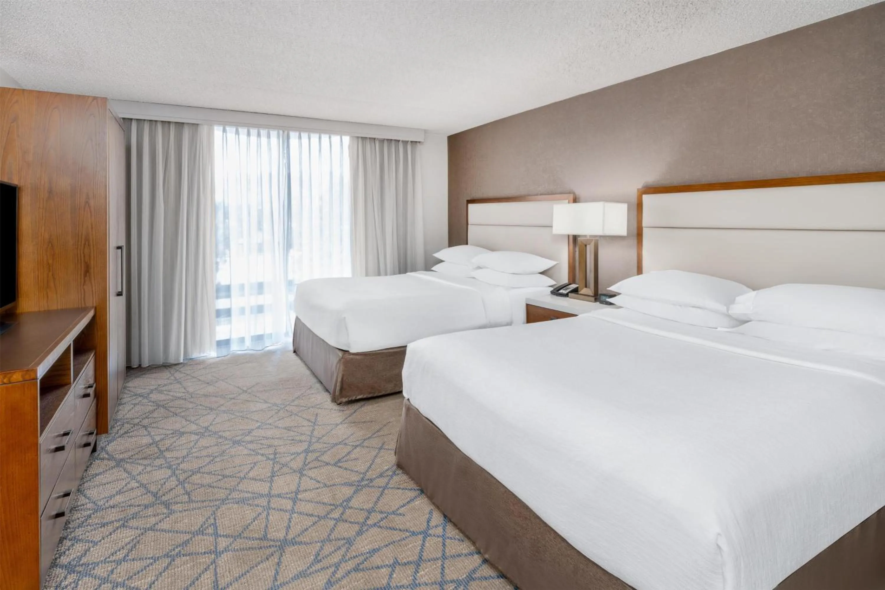 Bed in Embassy Suites by Hilton Colorado Springs