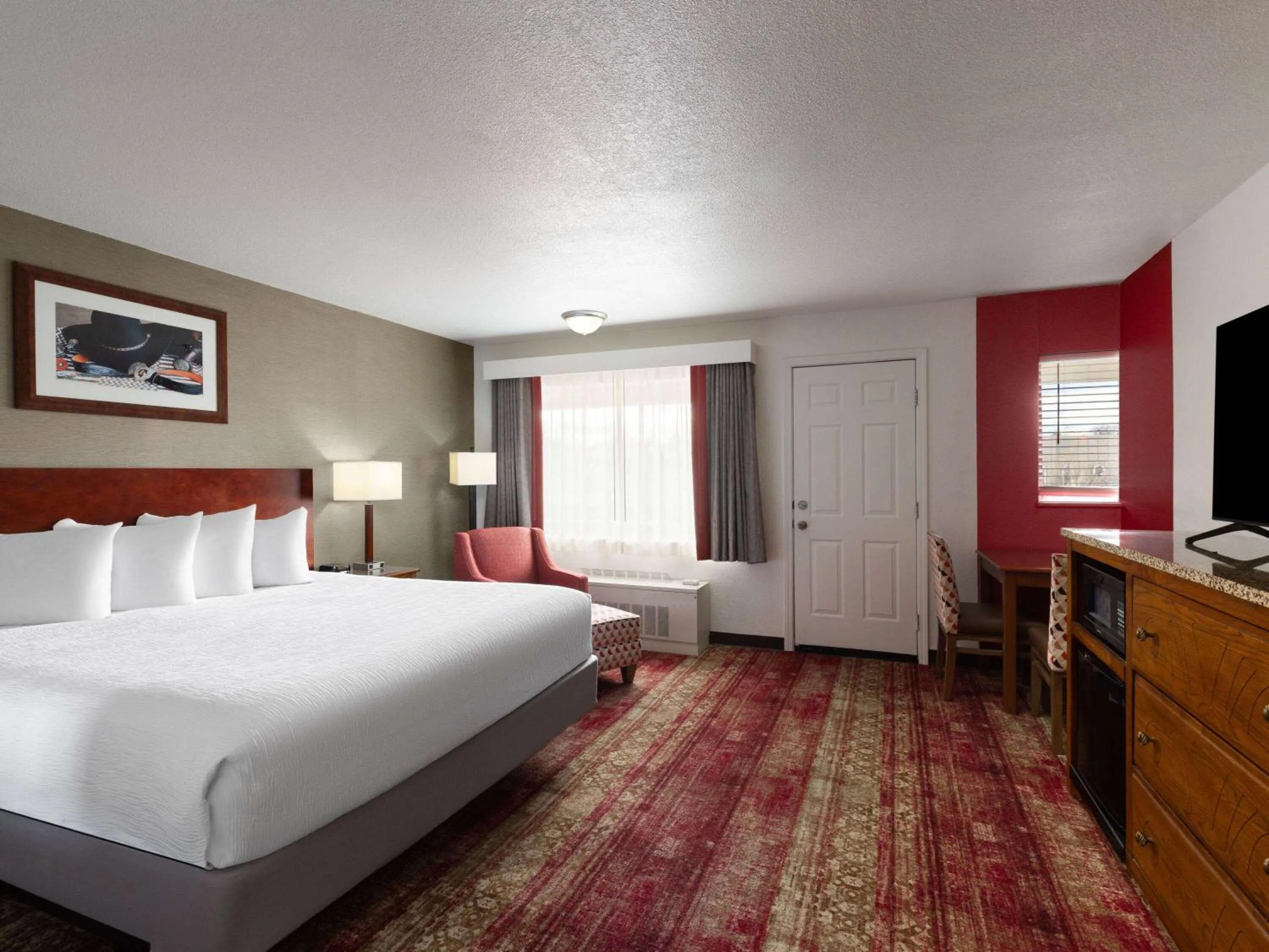 Photo of the whole room, Bed in Ramada by Wyndham Elko Hotel at Stockmen's Casino