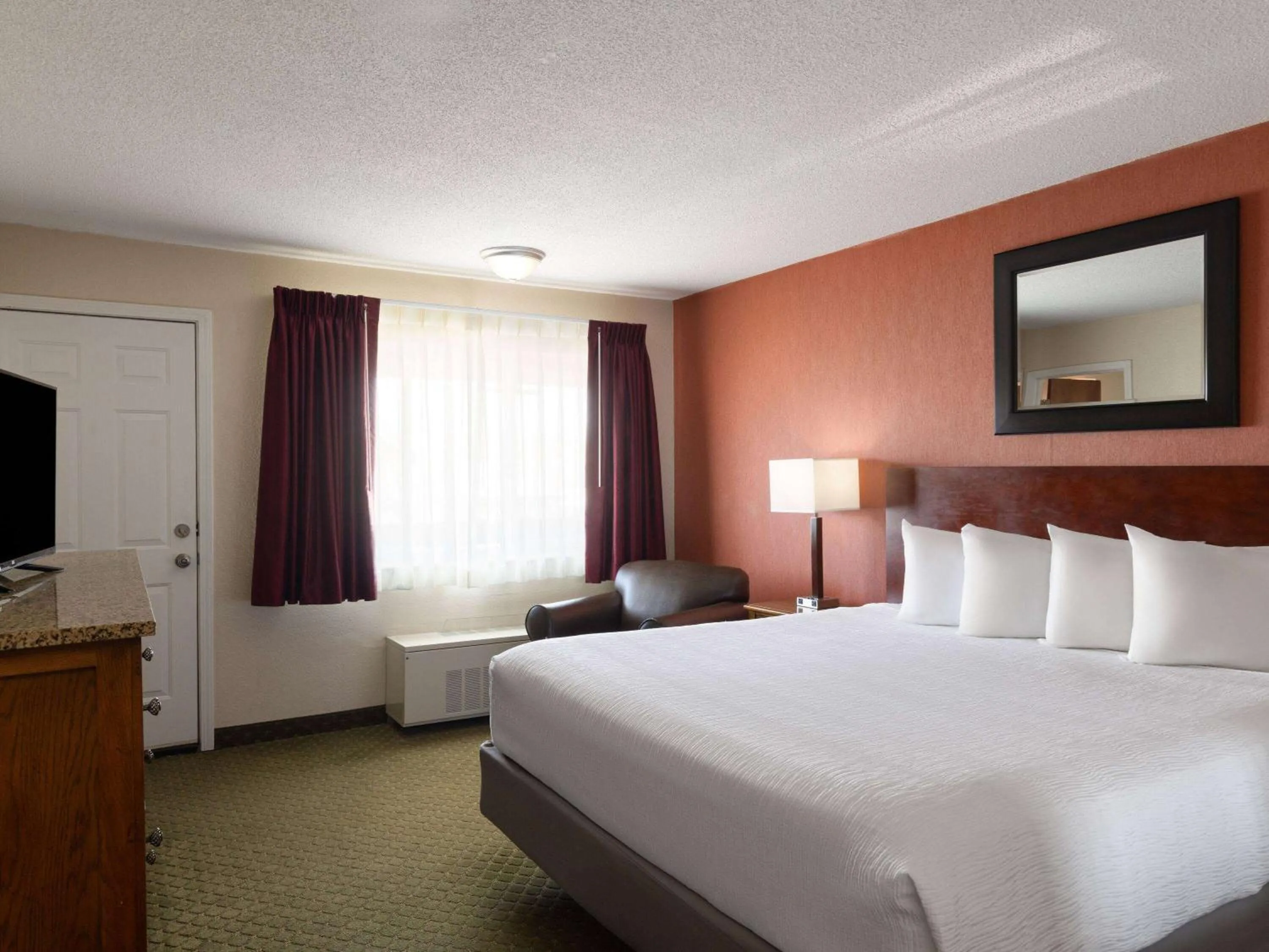 Photo of the whole room, Bed in Ramada by Wyndham Elko Hotel at Stockmen's Casino