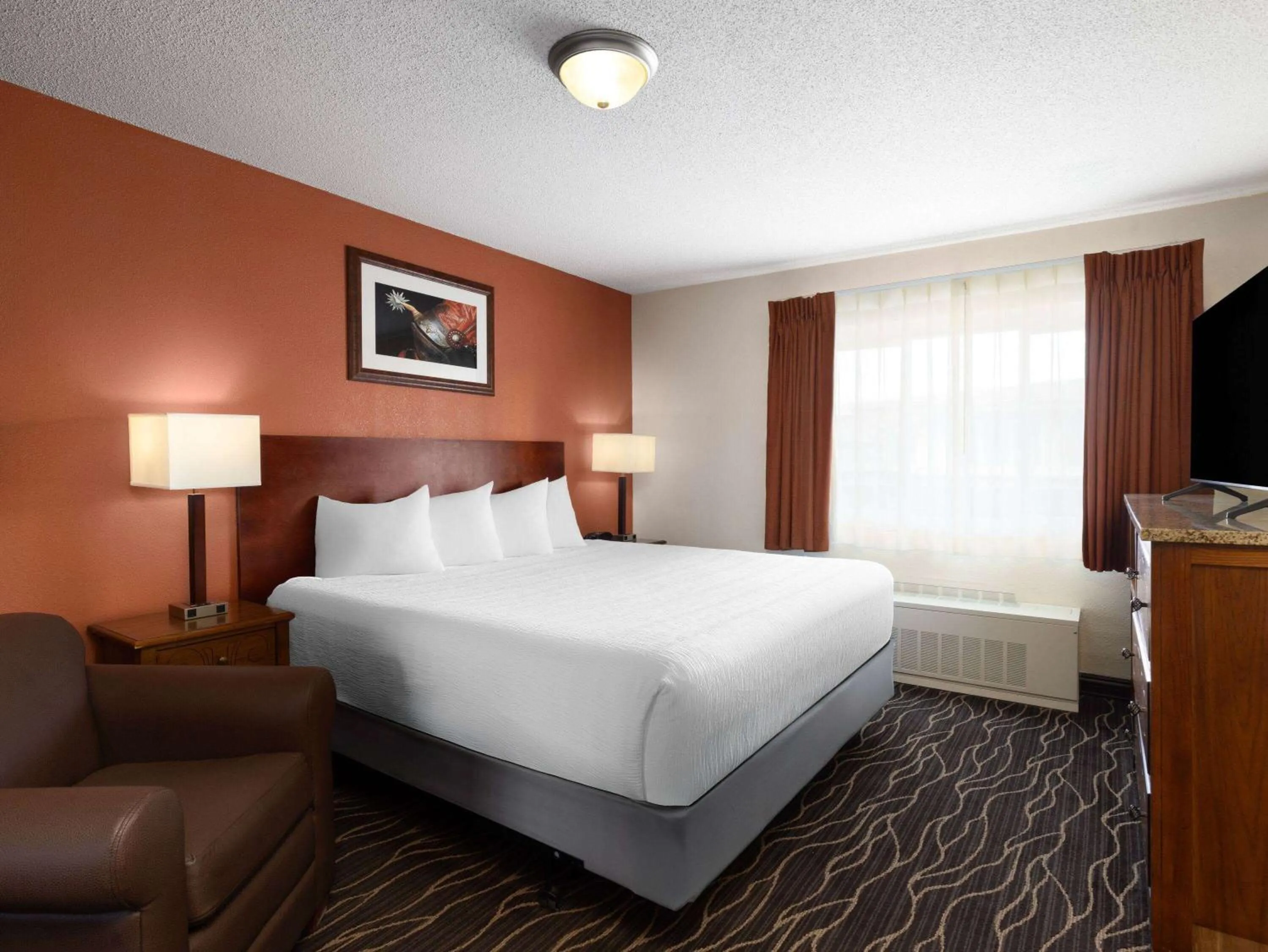 Photo of the whole room, Bed in Ramada by Wyndham Elko Hotel at Stockmen's Casino