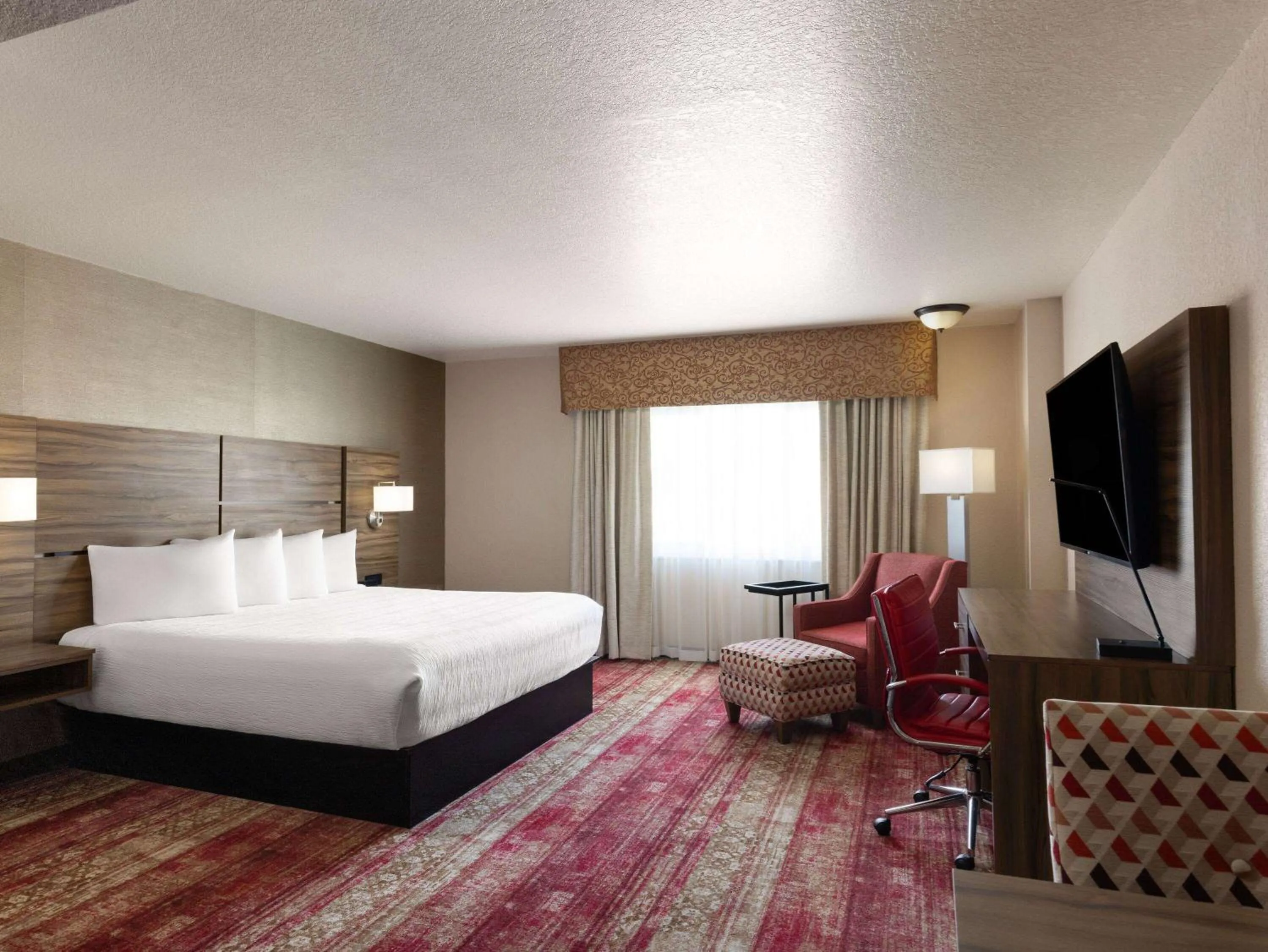 Photo of the whole room, Bed in Ramada by Wyndham Elko Hotel at Stockmen's Casino