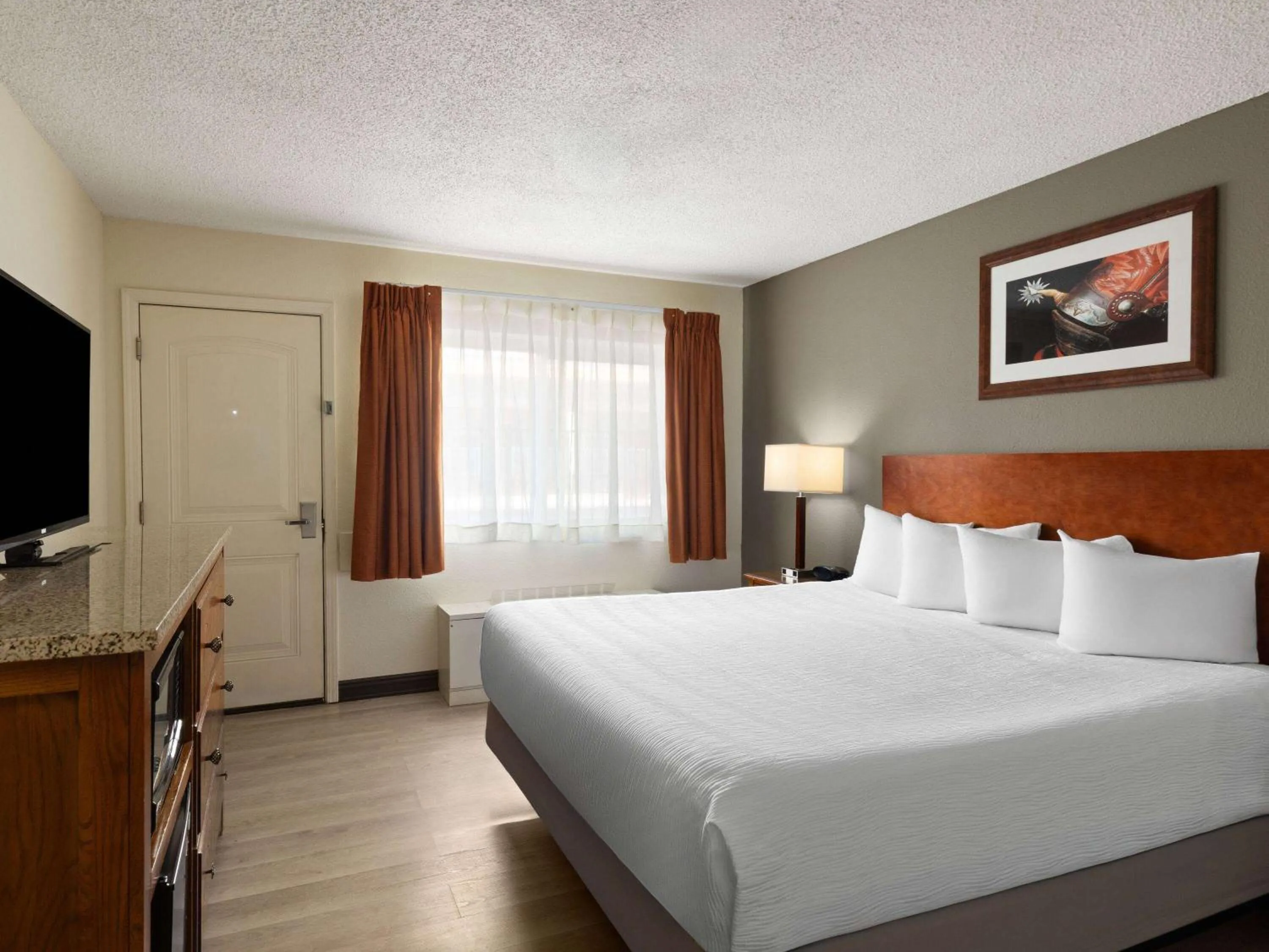 Photo of the whole room, Bed in Ramada by Wyndham Elko Hotel at Stockmen's Casino