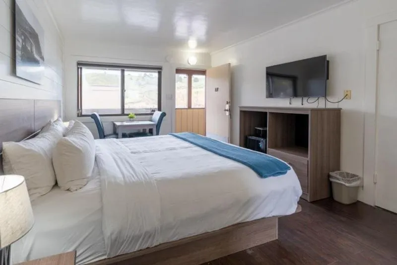 Bed in Sea Breeze Motel