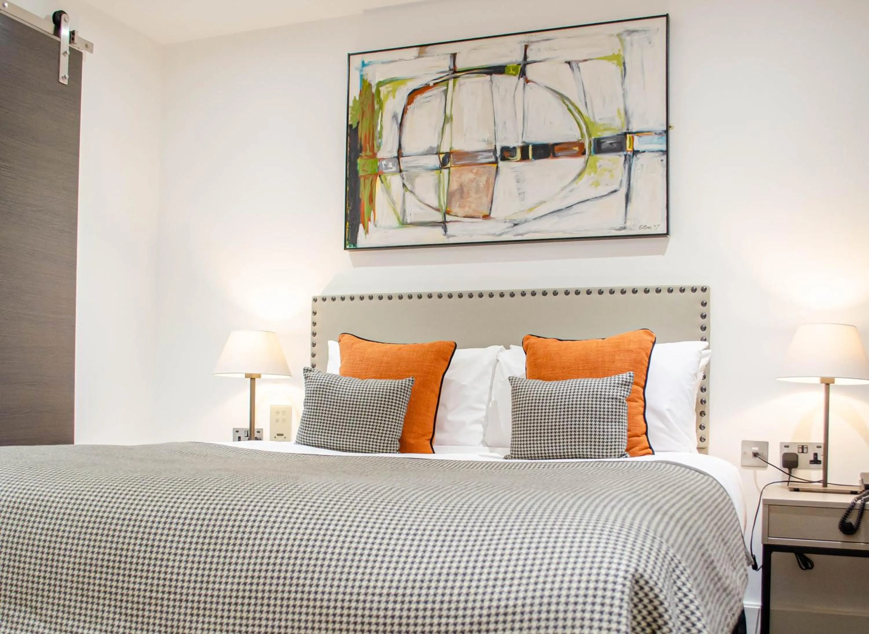 Bed in The Chronicle by Supercity Aparthotels