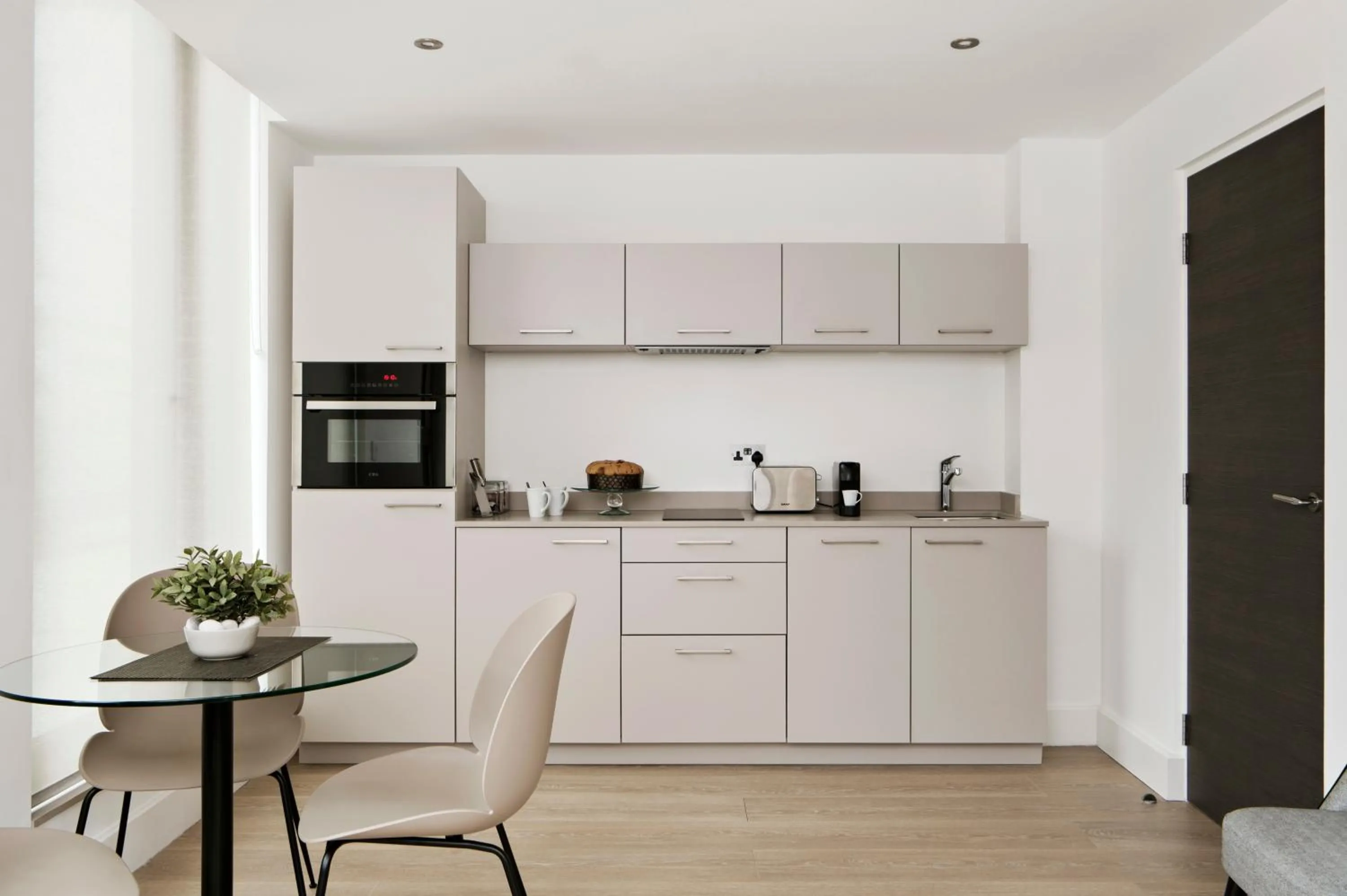 Kitchen or kitchenette in The Chronicle by Supercity Aparthotels