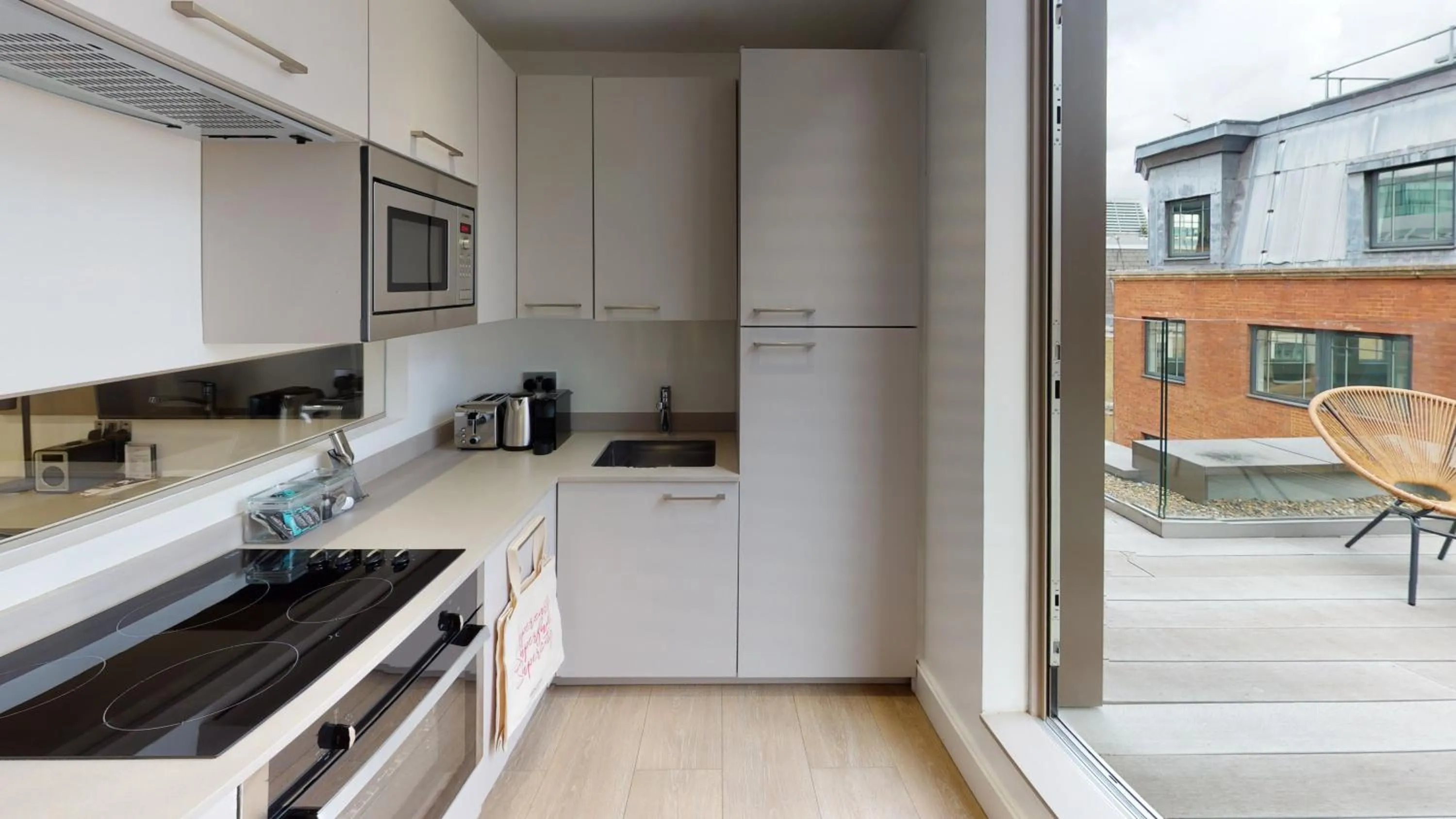 kitchen in The Chronicle by Supercity Aparthotels