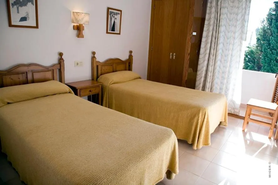 Bed in Apartamentos Leo