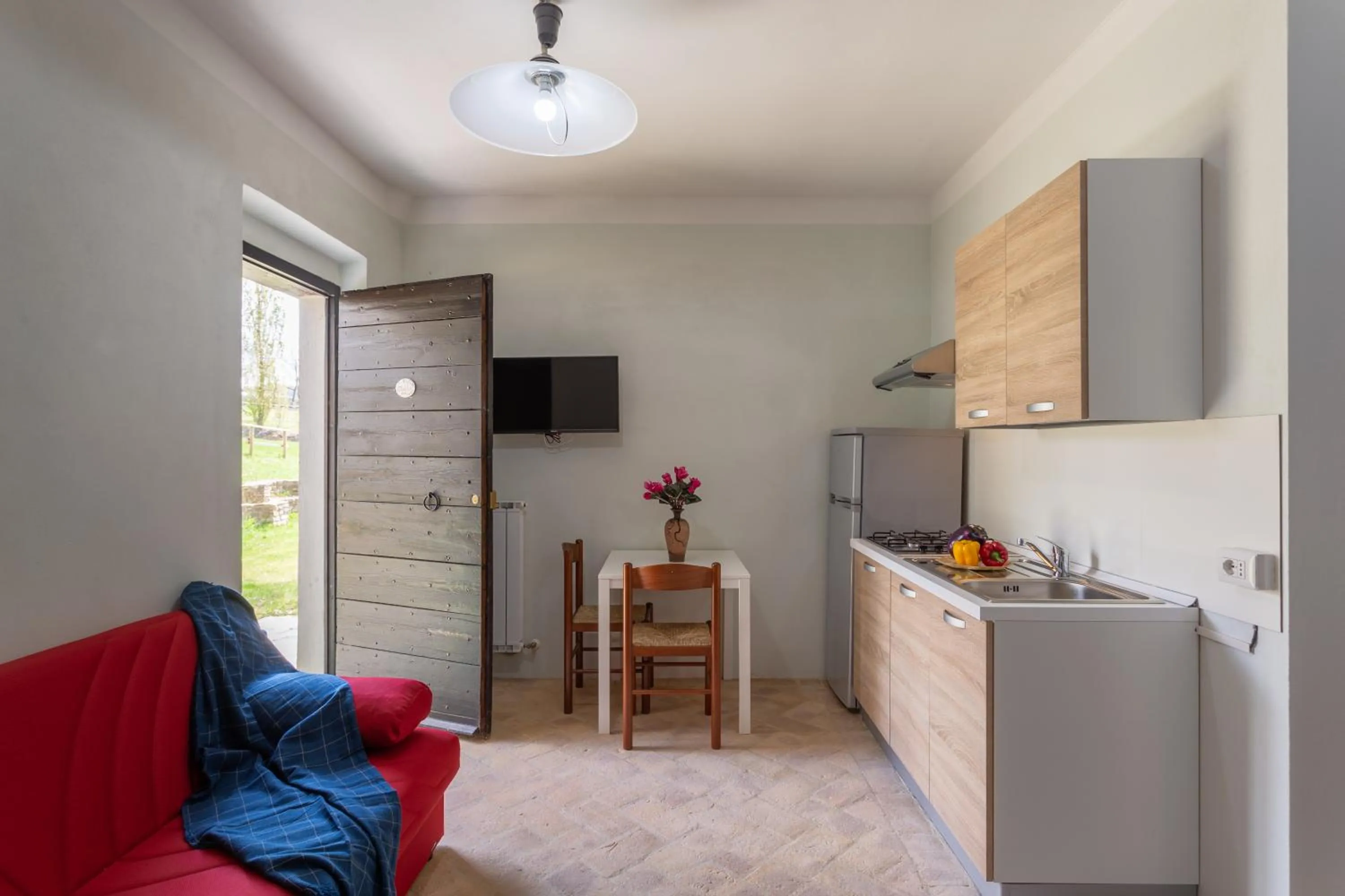 Kitchen or kitchenette in GH Borgo Pulciano Agriturismo