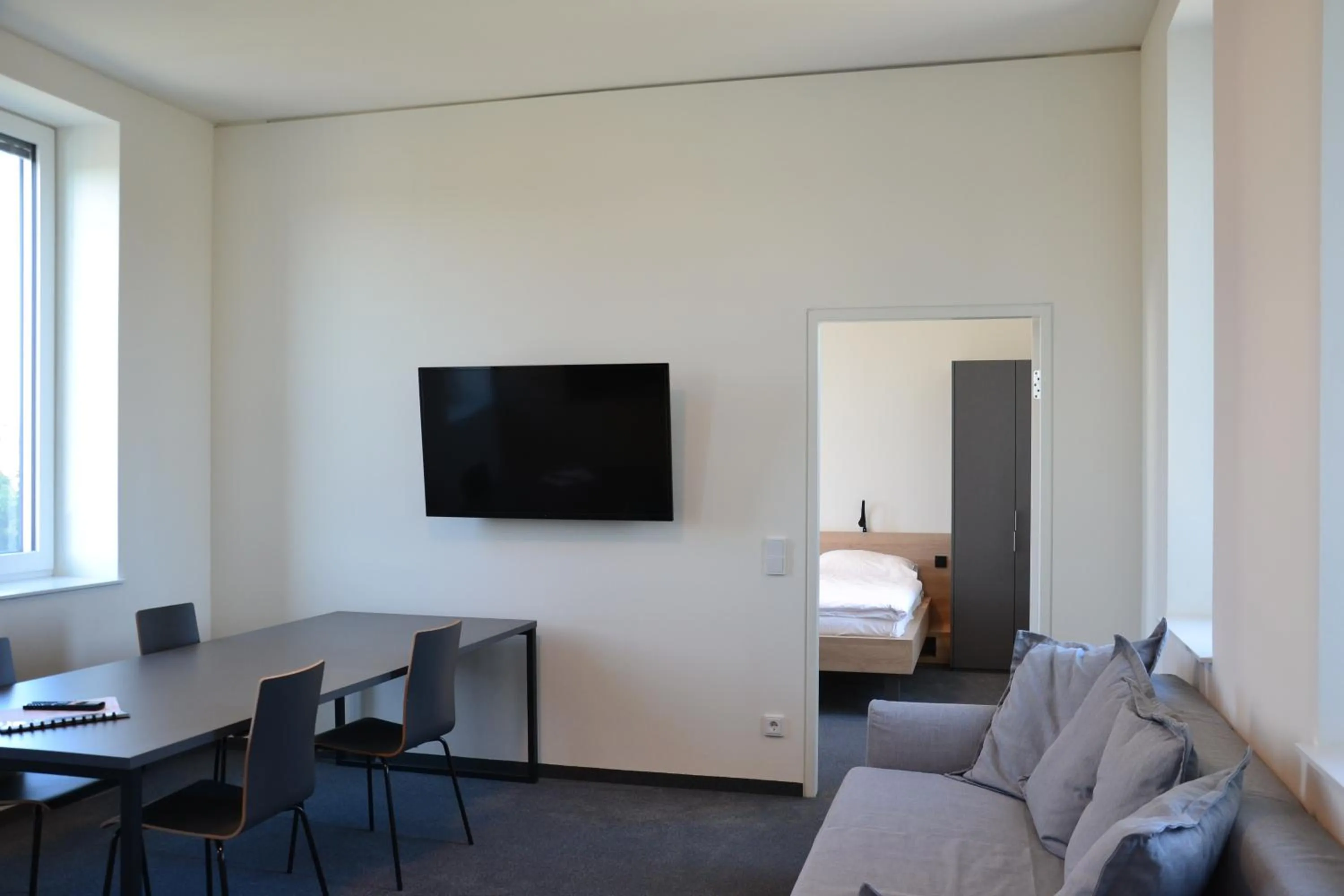 Communal lounge/ TV room in TT-ROOMS - kontaktlos mit Self Check-in I FREE PARKING