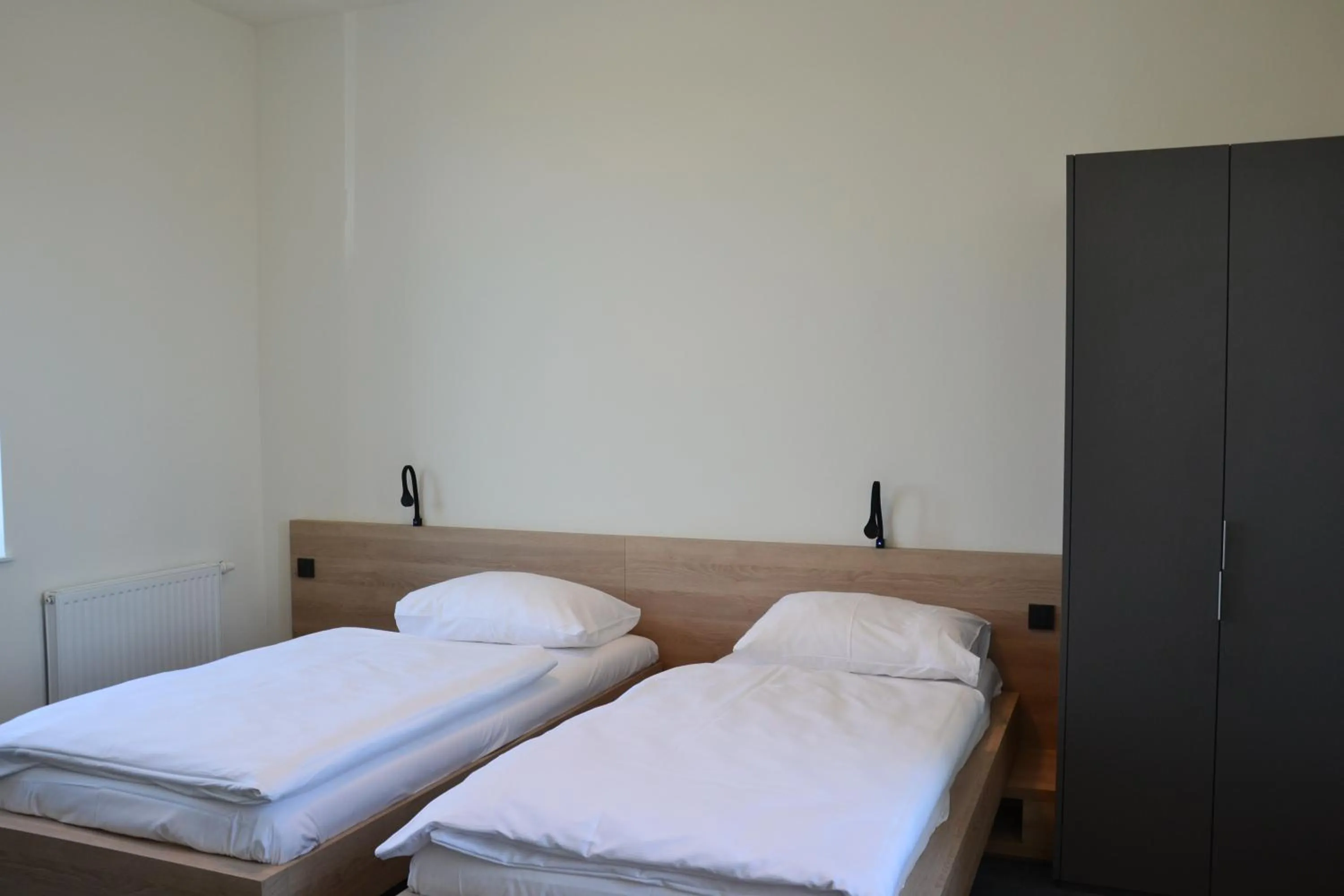 Bed in TT-ROOMS - kontaktlos mit Self Check-in I FREE PARKING