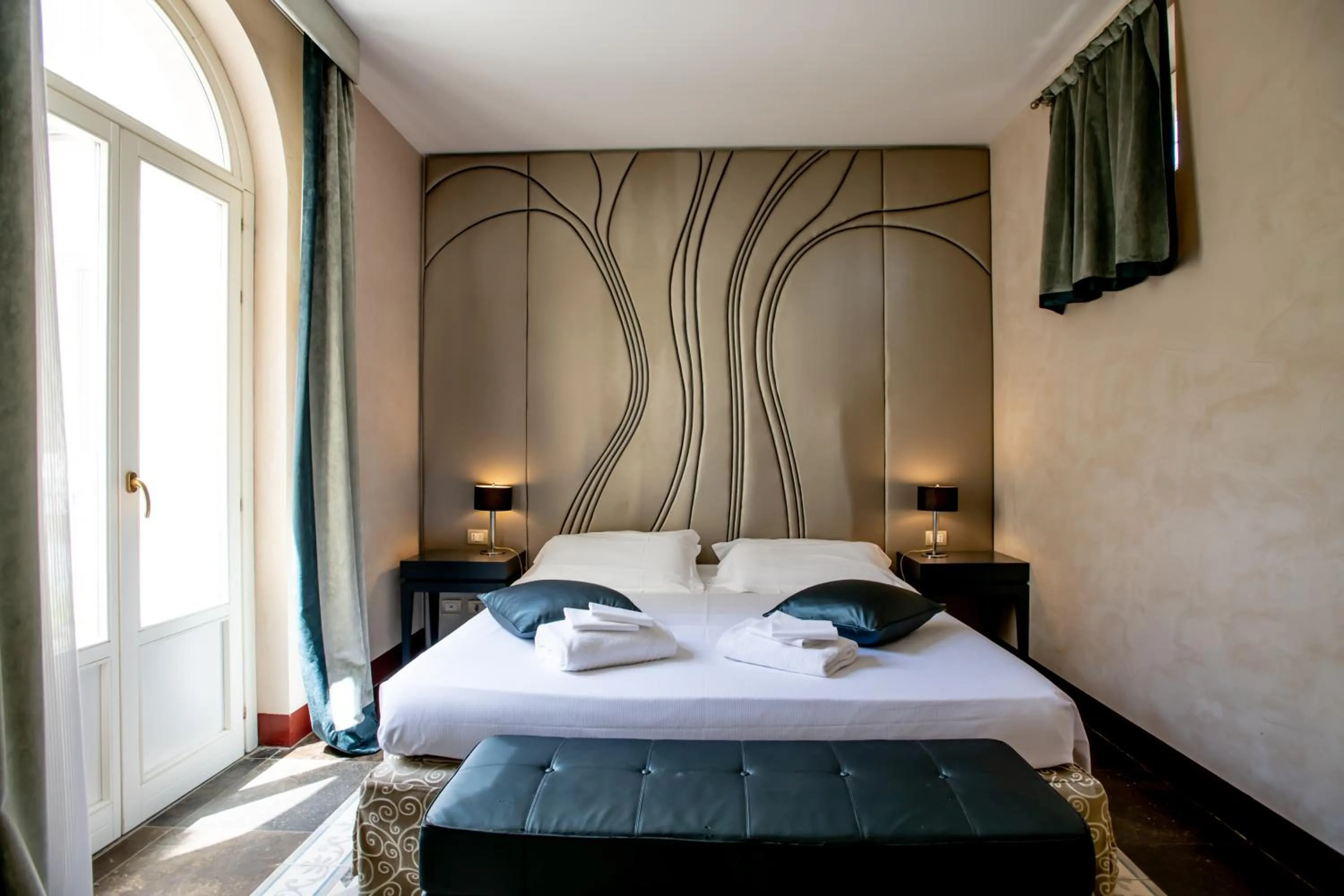 Bed in De Stefano Palace Luxury Hotel